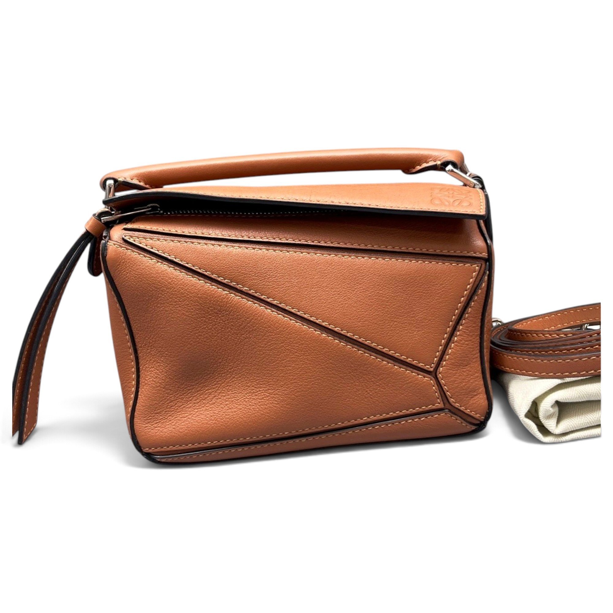 Puzzle leather handbag