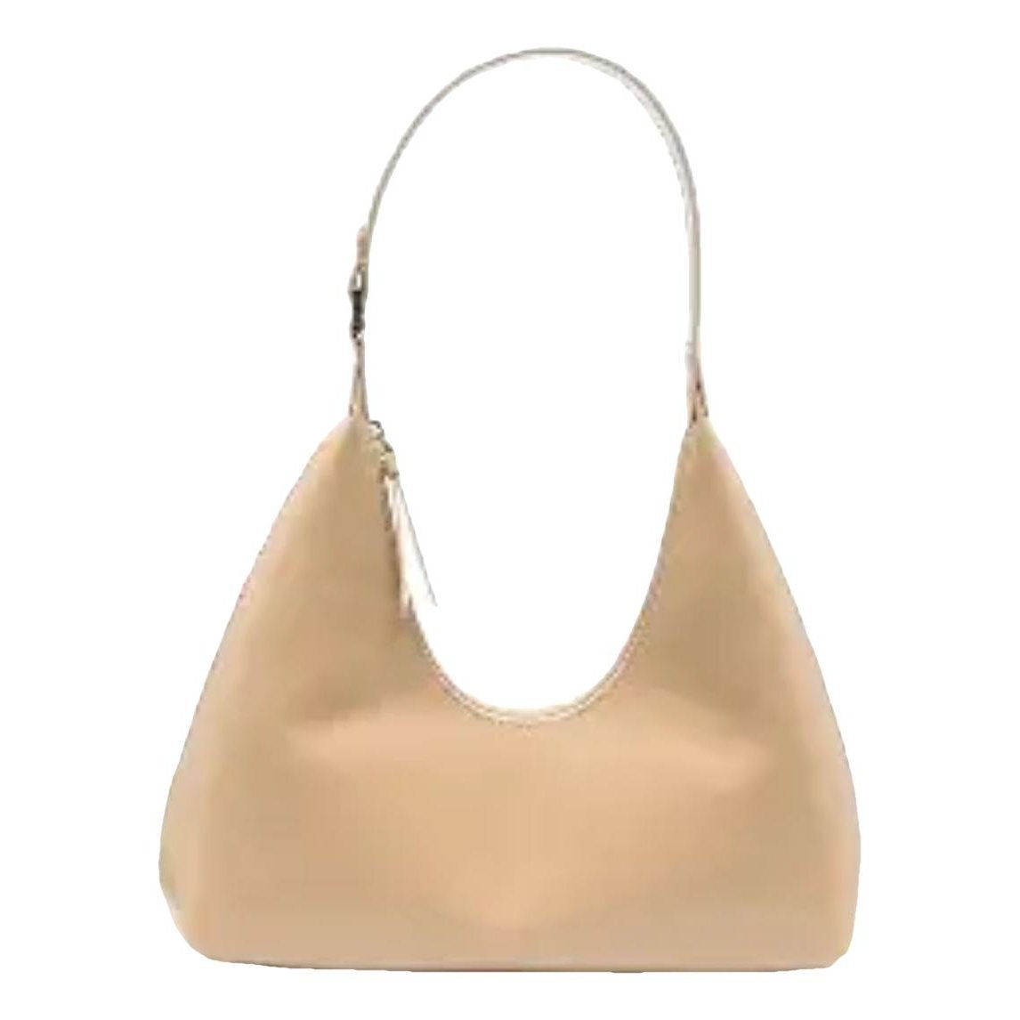 Amber patent leather handbag