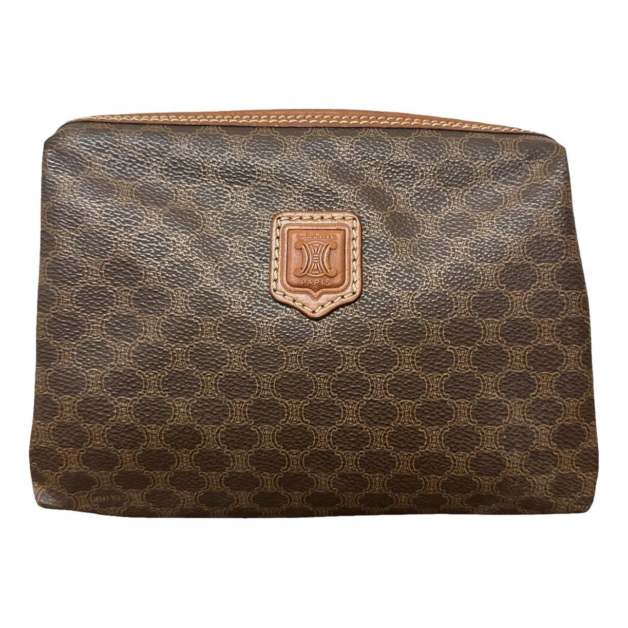 Triomphe Vintage leather clutch bag