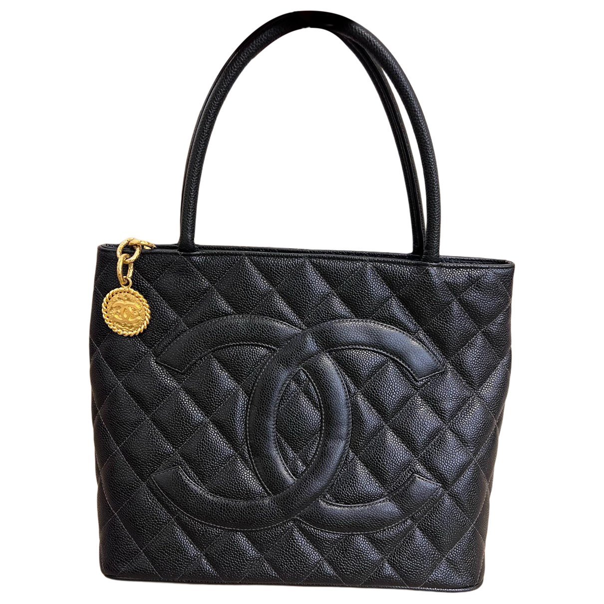Médaillon leather handbag
