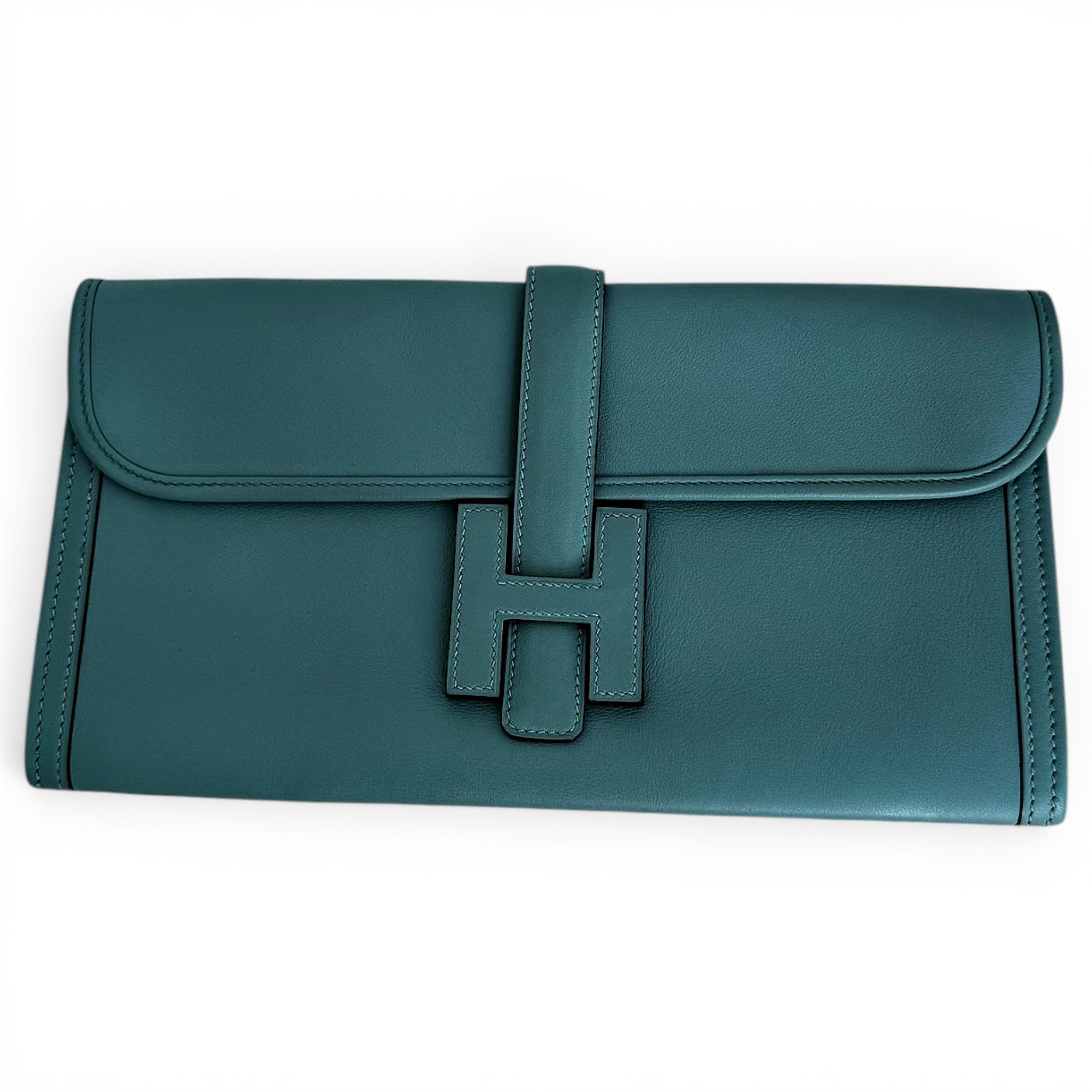 Jige leather clutch bag