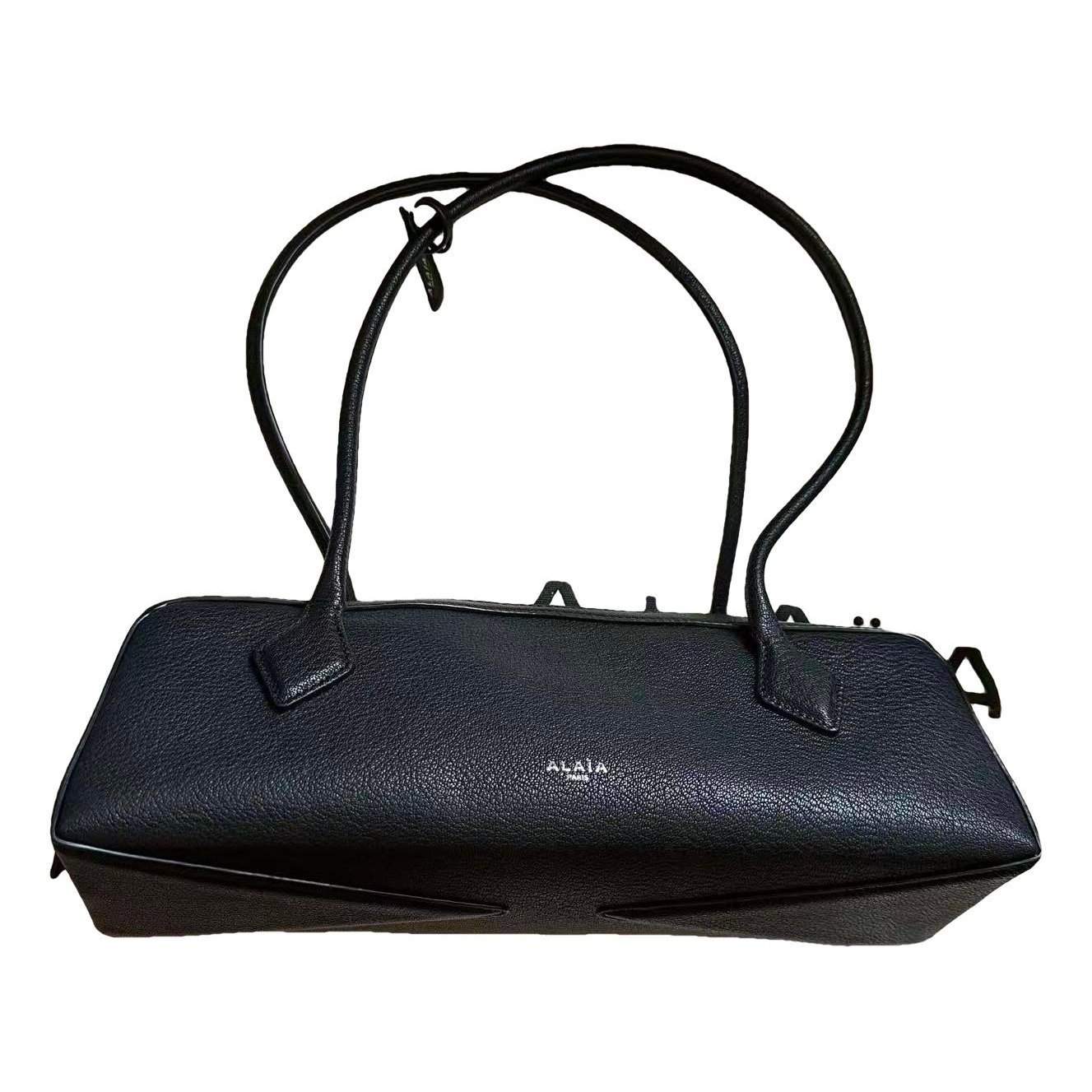 Le Teckel leather handbag
