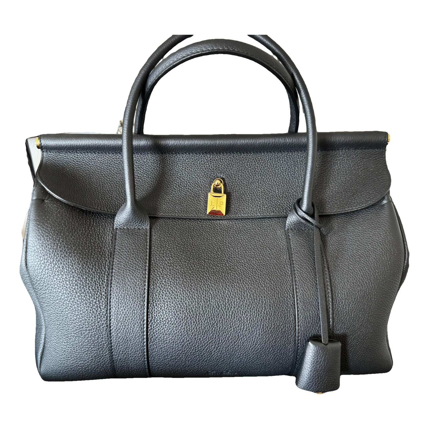 Loom leather handbag