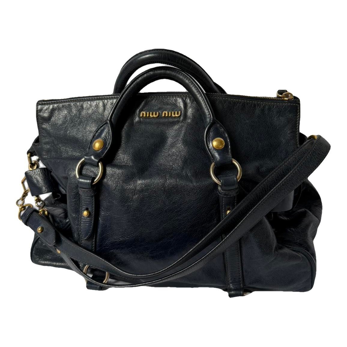 Bow bag leather handbag