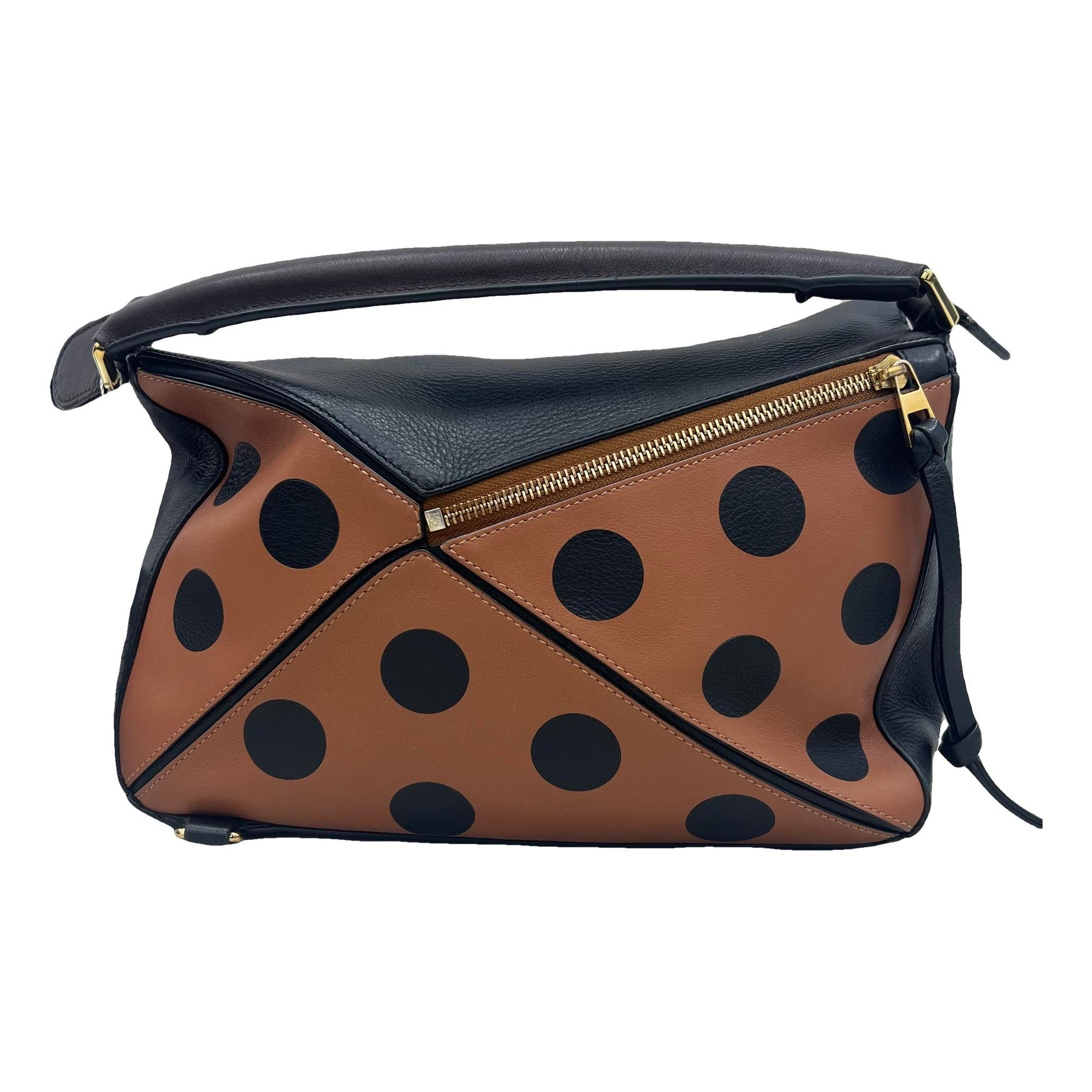 Puzzle leather handbag