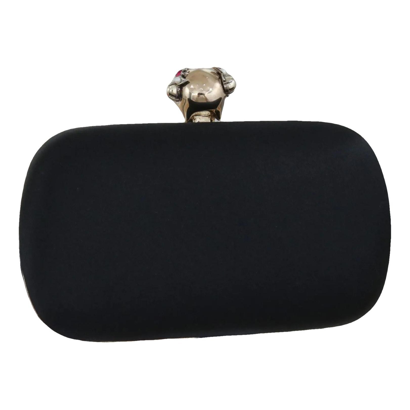 Knuckle silk clutch bag