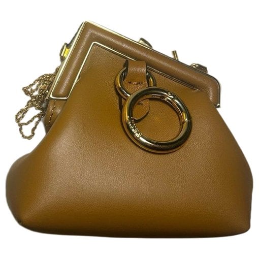 First leather mini bag