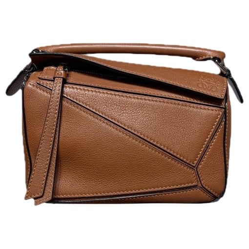 Puzzle leather handbag