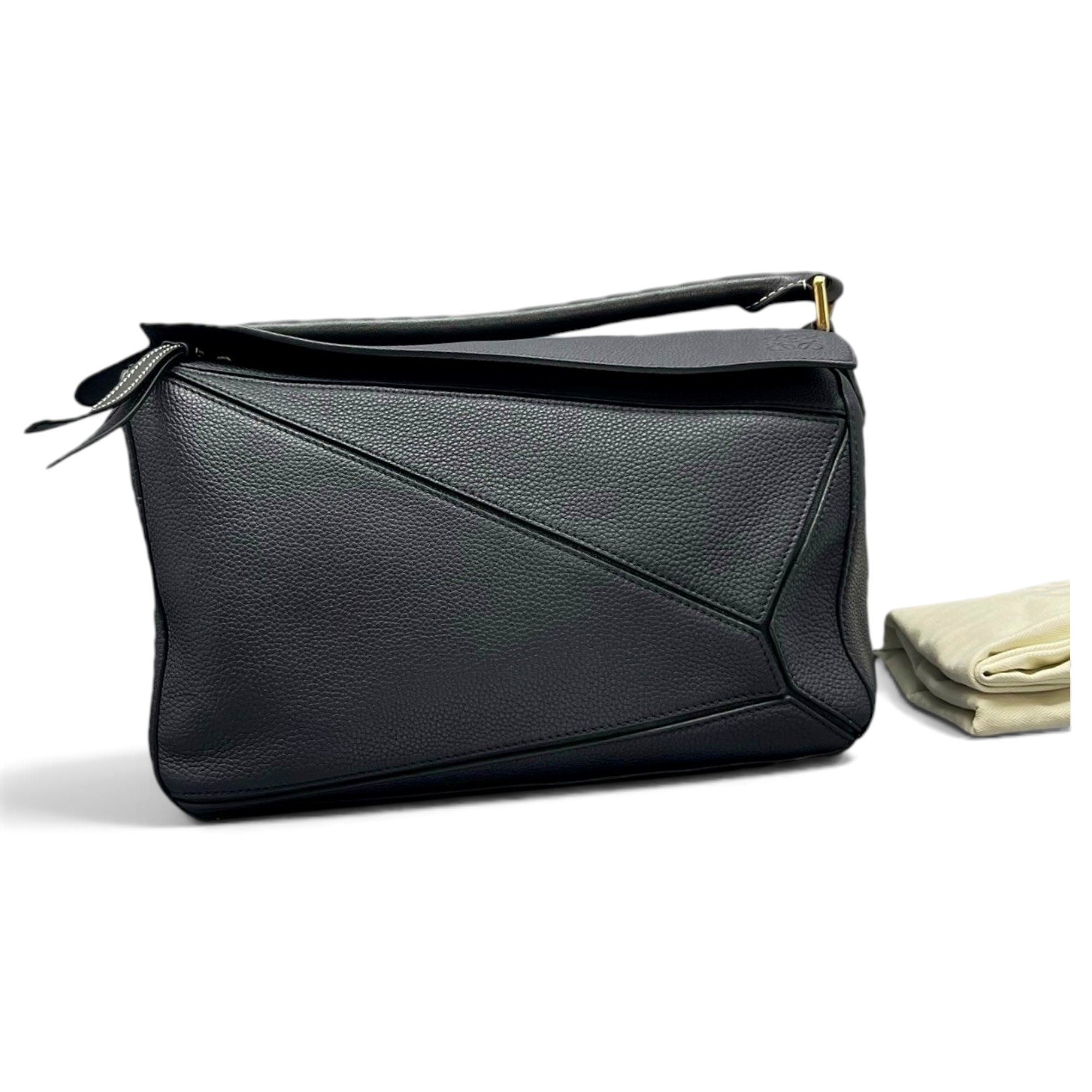 Puzzle leather handbag
