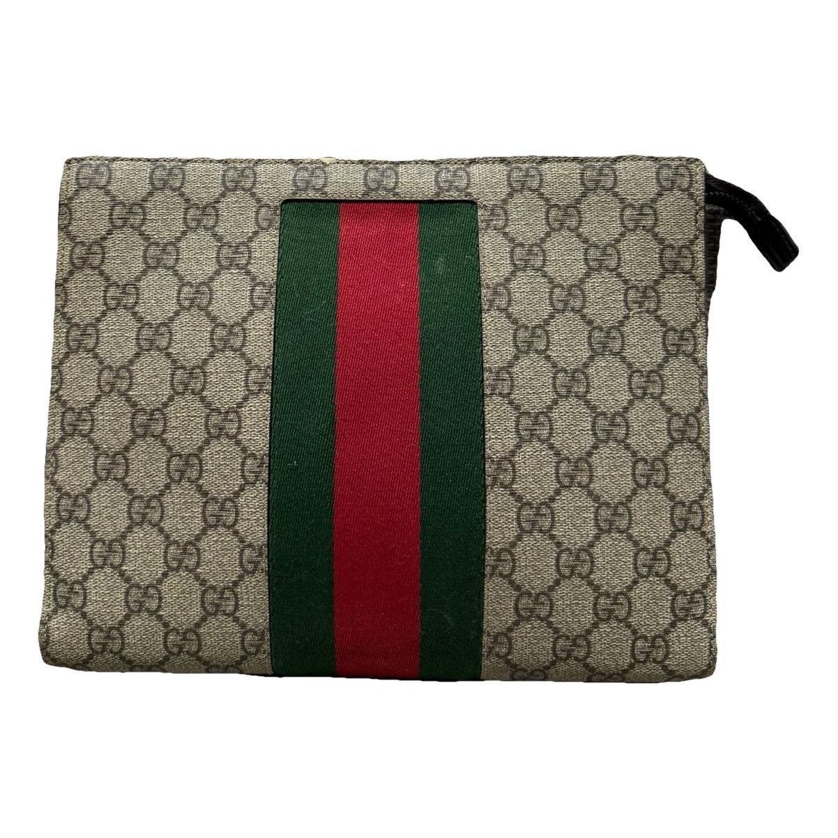 Ophidia cloth clutch bag