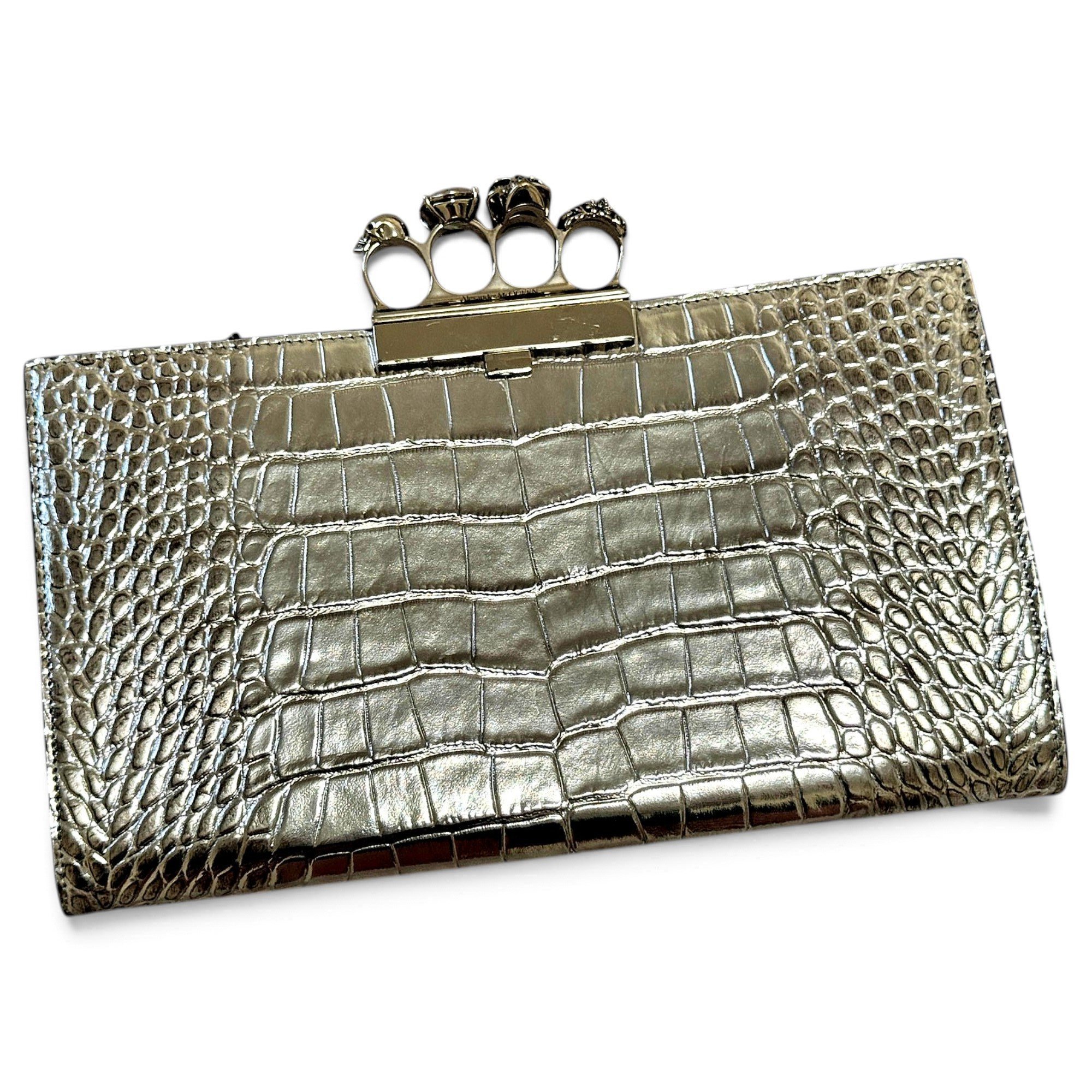 Knuckle leather clutch bag