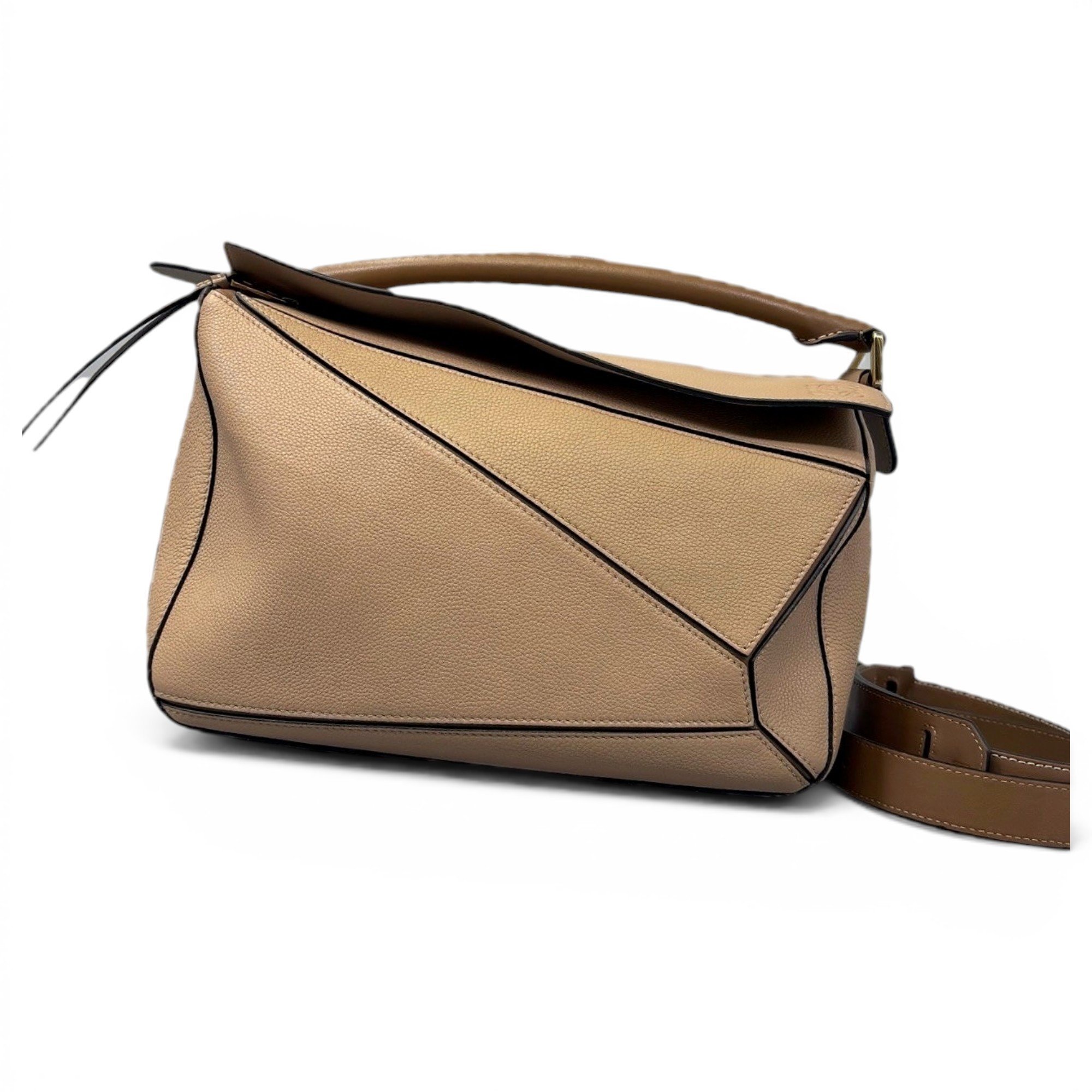 Puzzle leather handbag