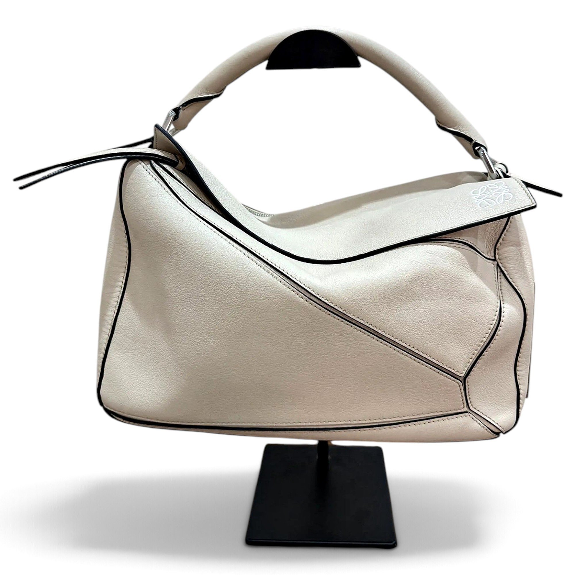 Puzzle leather handbag