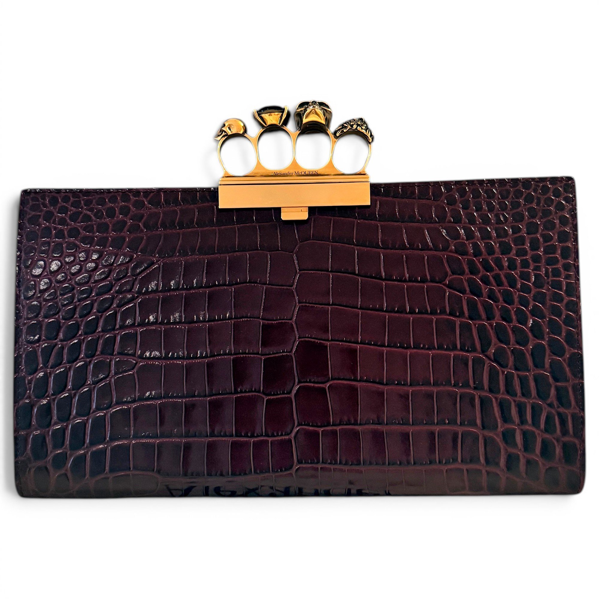 Knuckle leather clutch bag