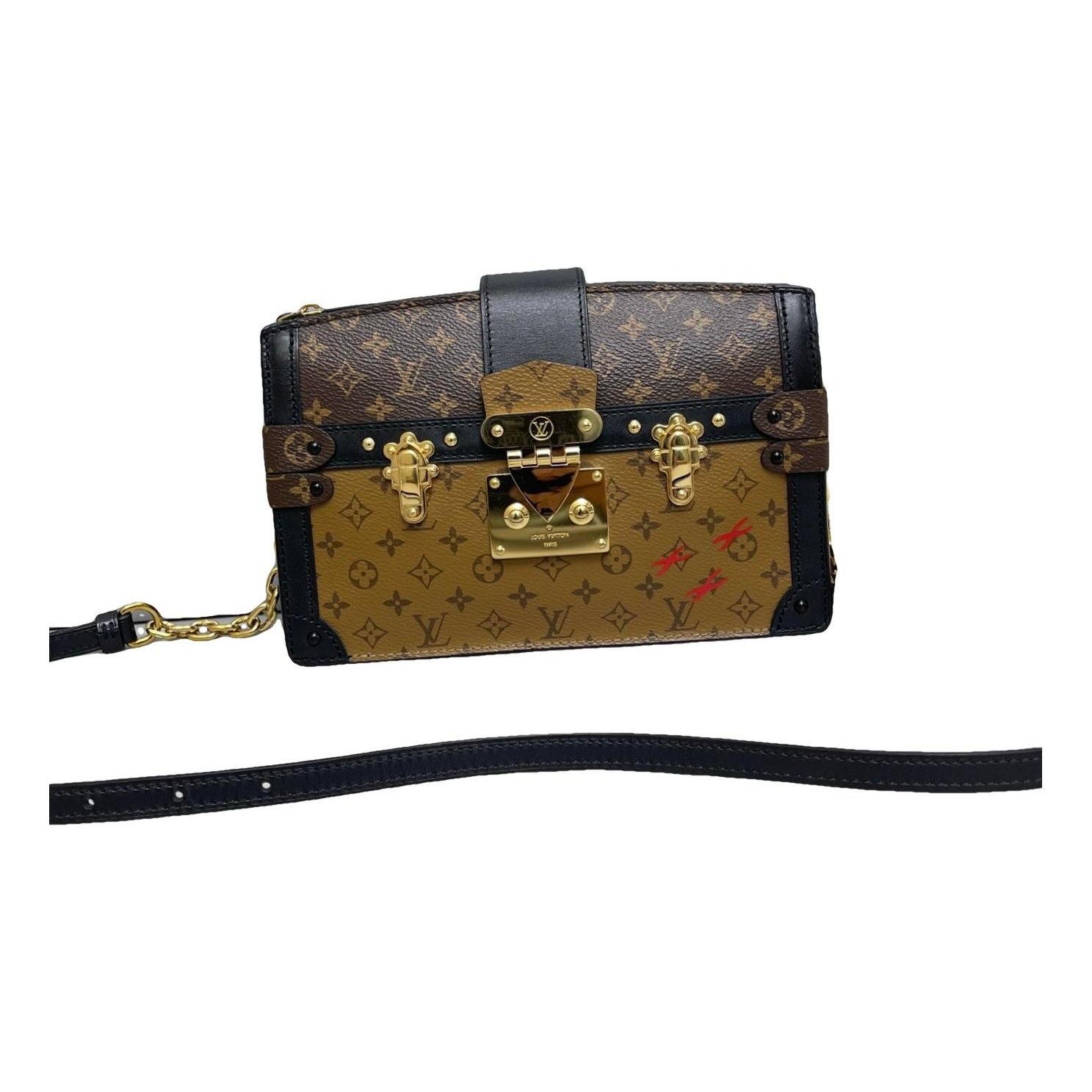 Pochette Trunk leather handbag