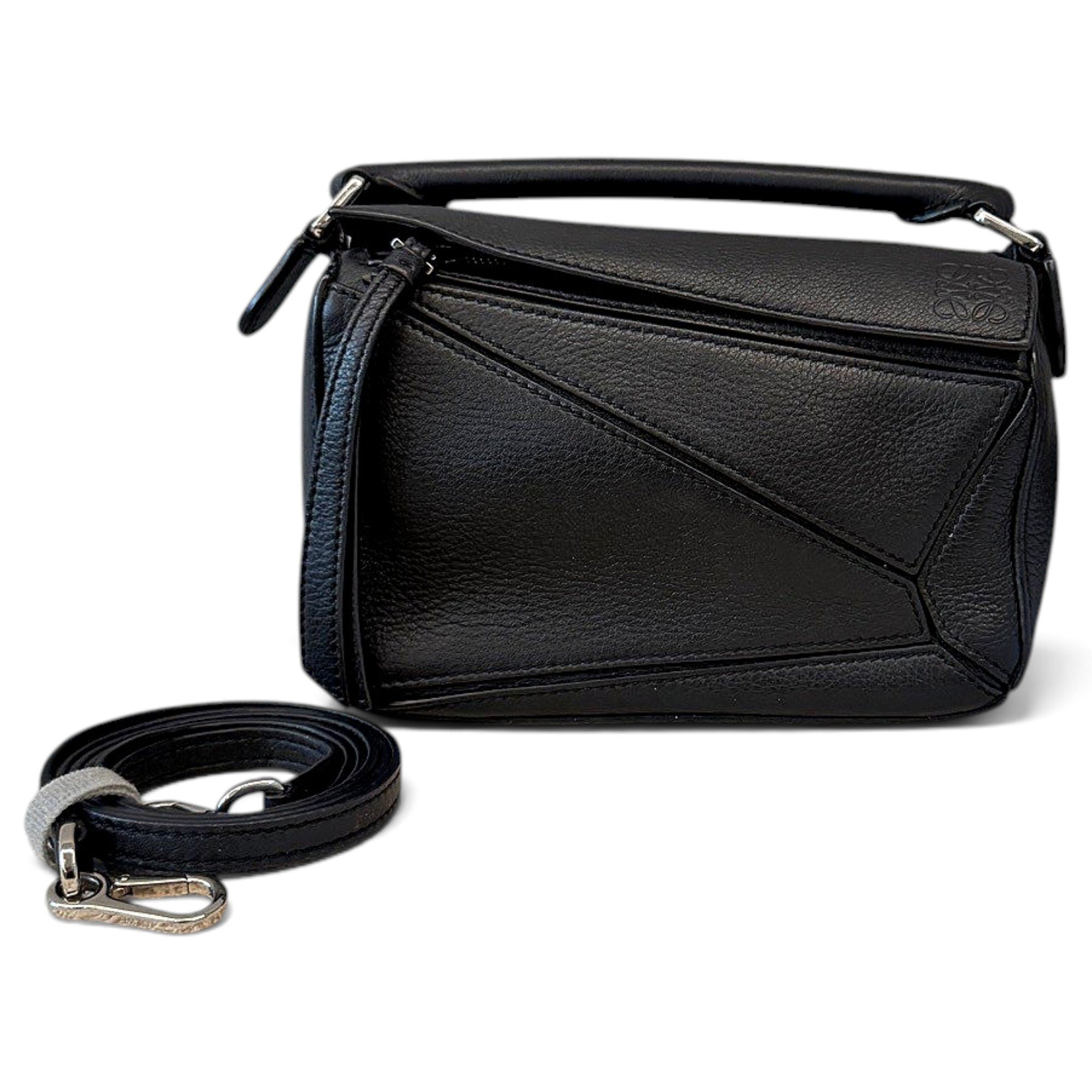 Puzzle leather handbag