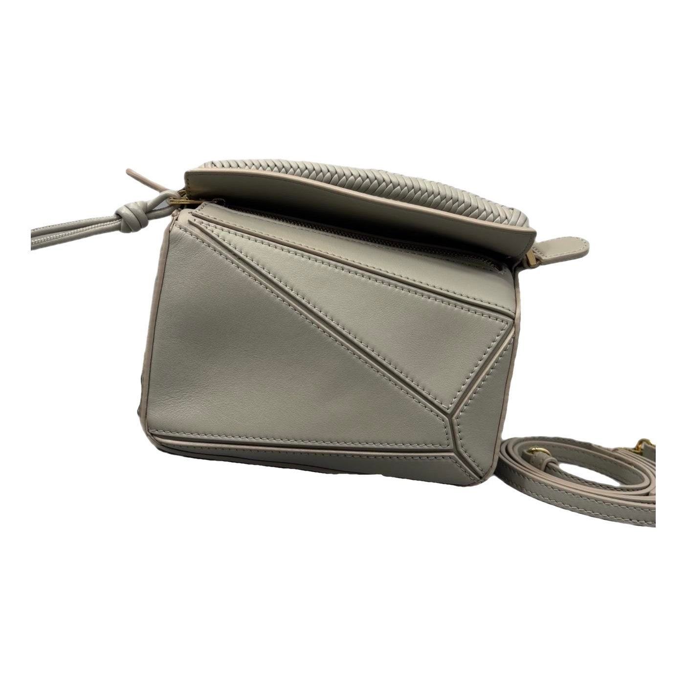 Puzzle leather handbag