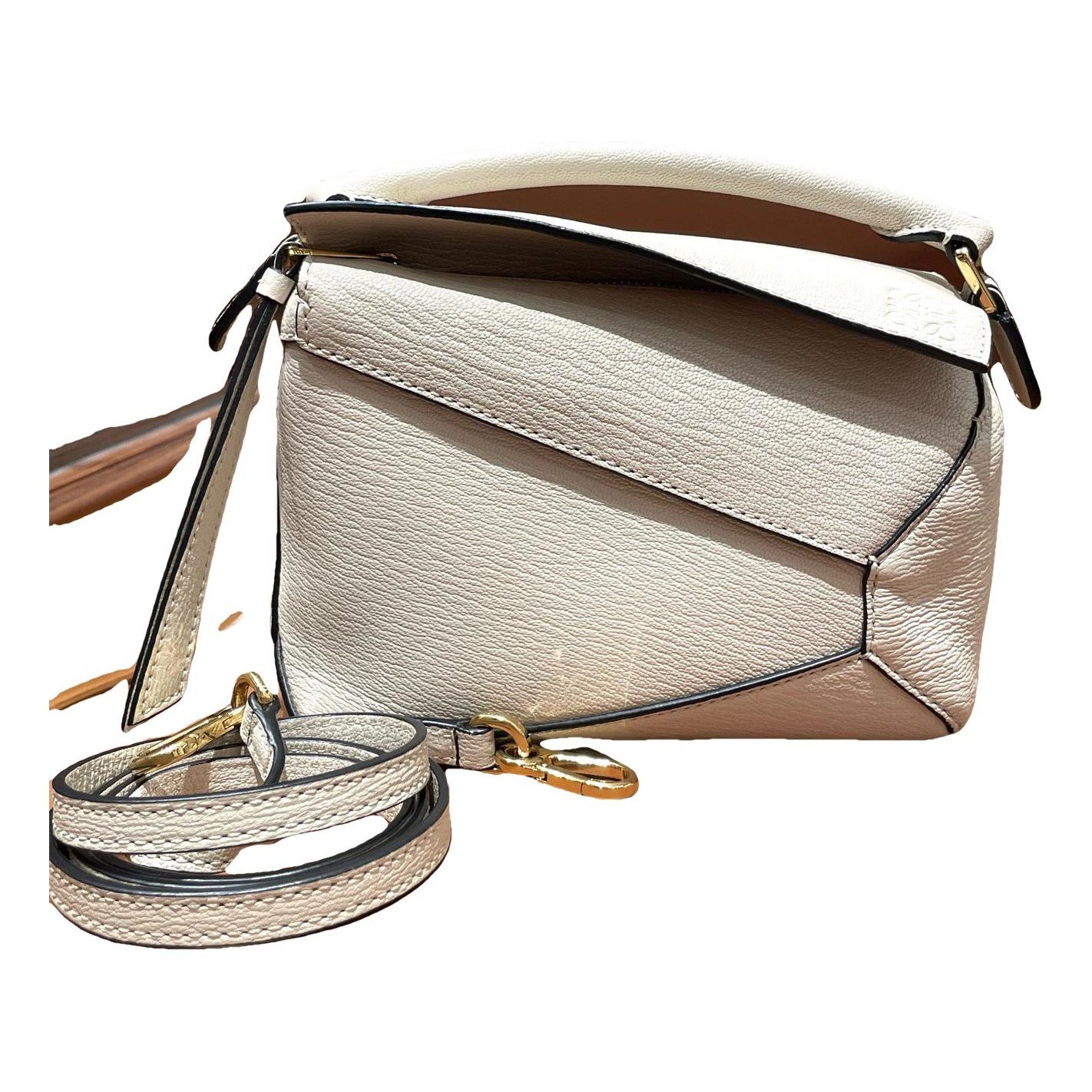 Puzzle leather handbag
