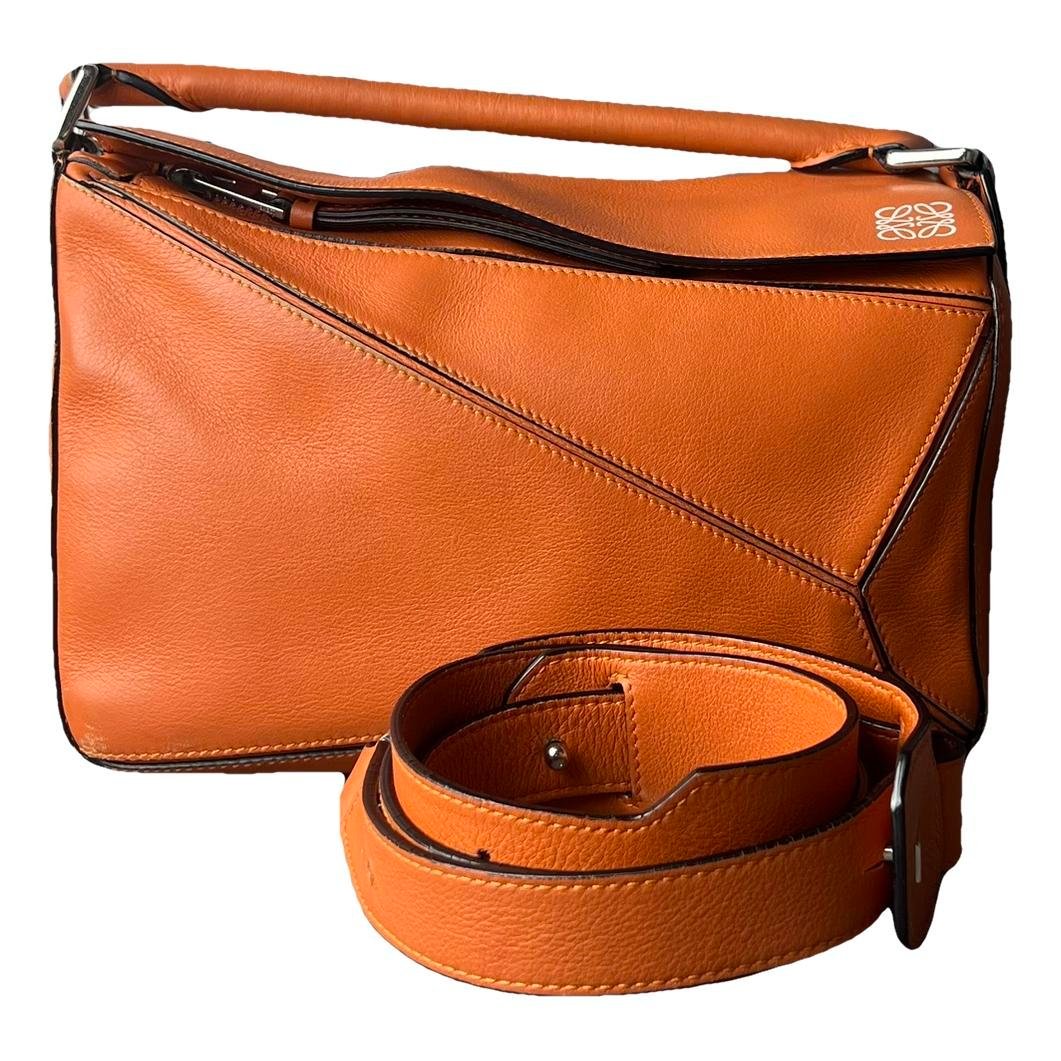 Puzzle leather handbag