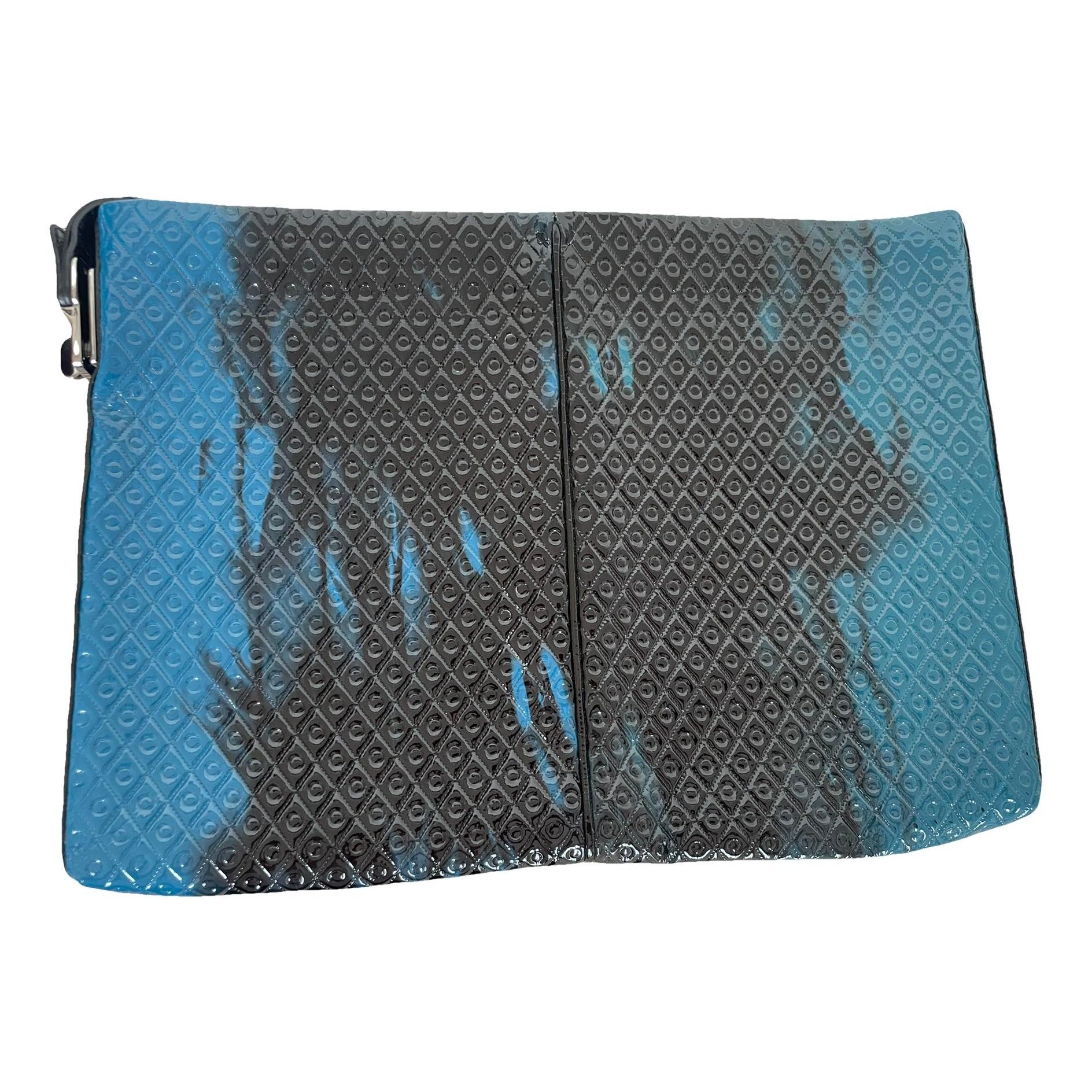 Patent leather clutch bag