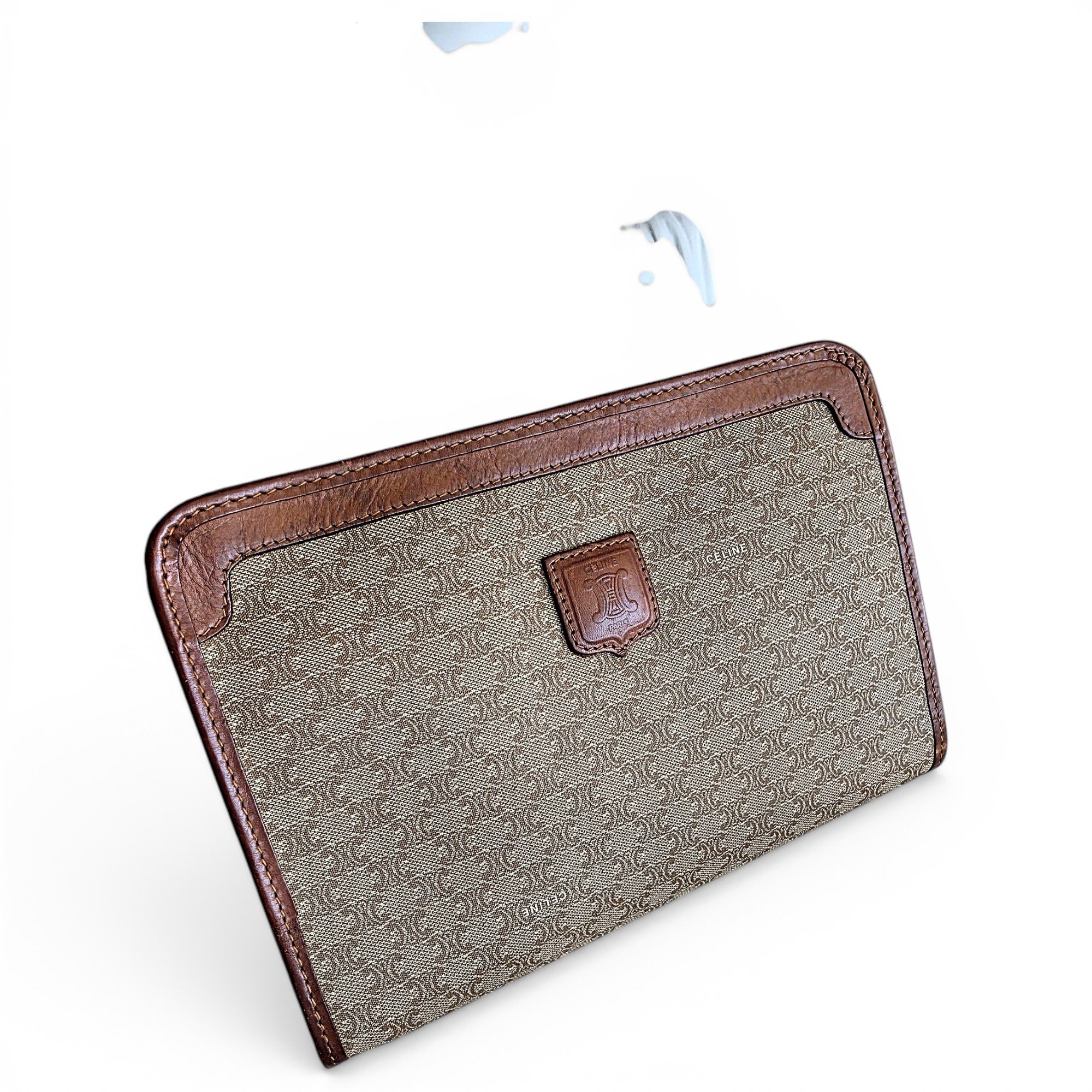 Triomphe Vintage leather clutch bag