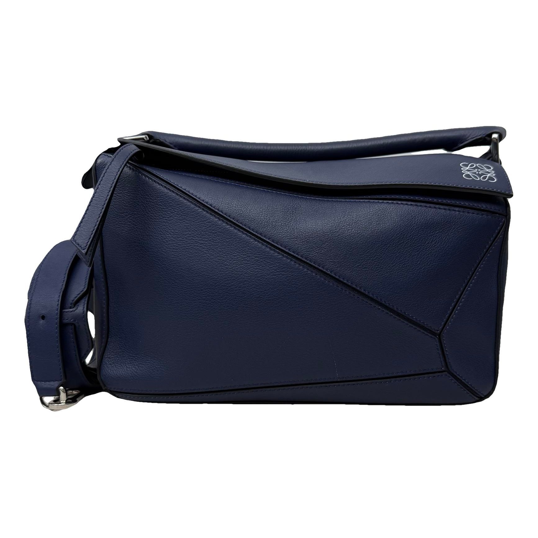 Puzzle leather handbag