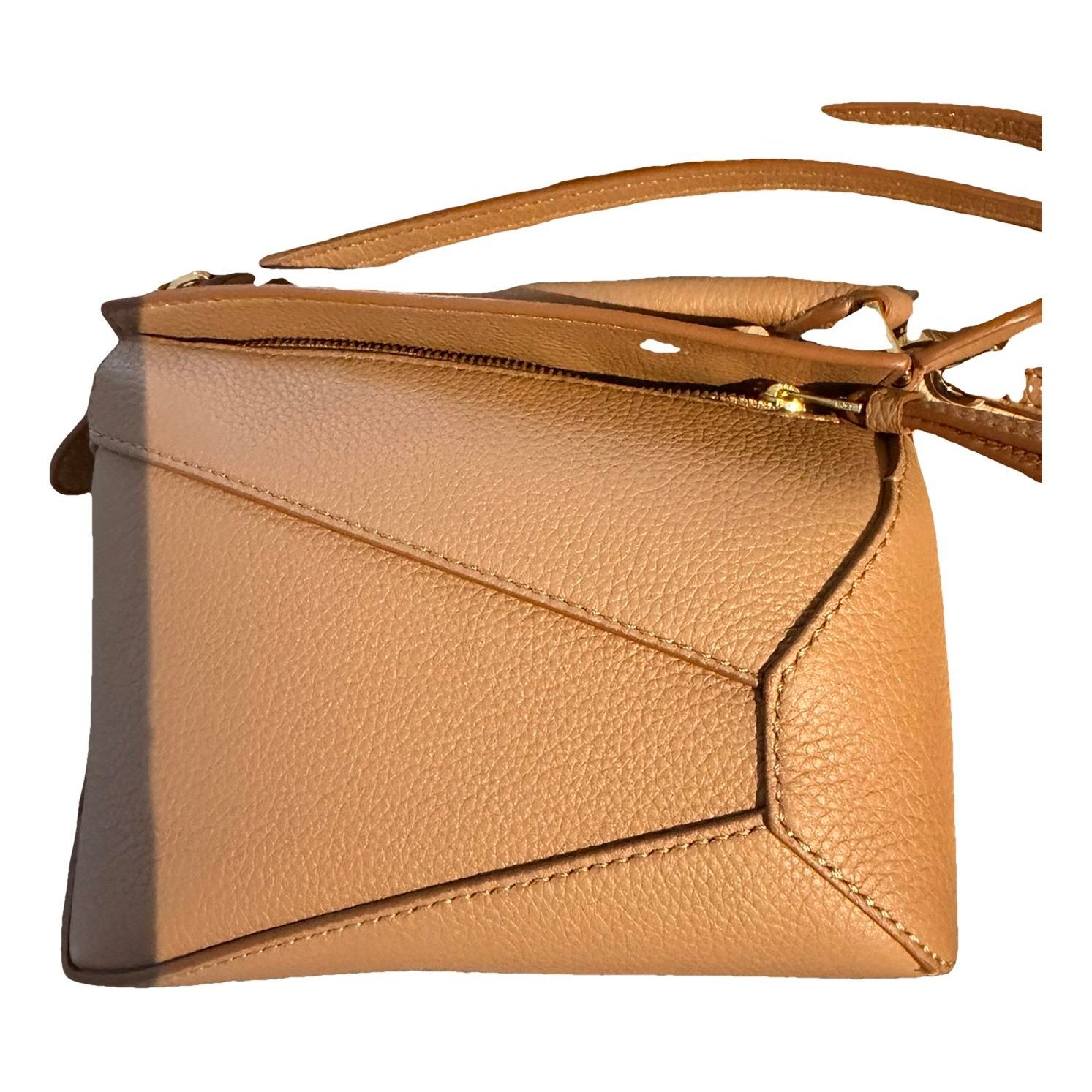 Puzzle leather handbag