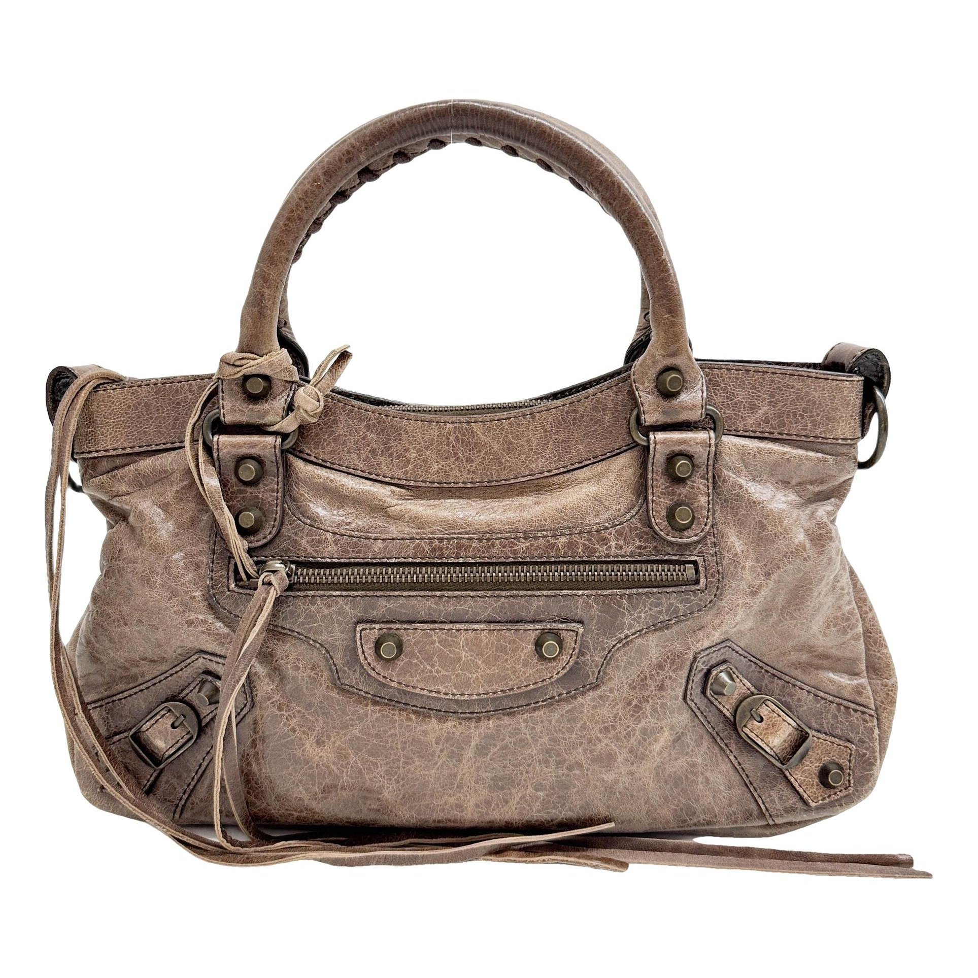 First leather handbag