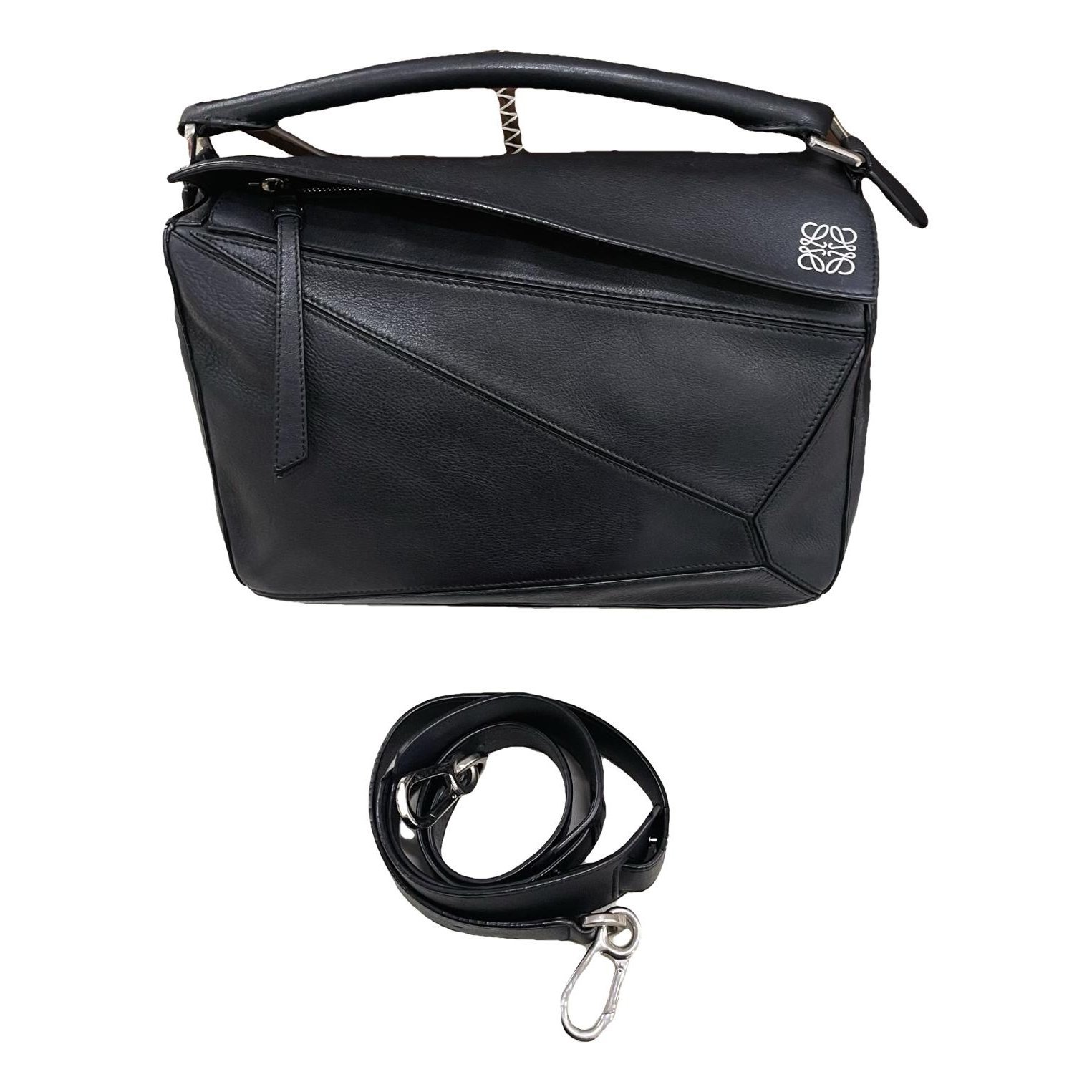 Puzzle leather handbag