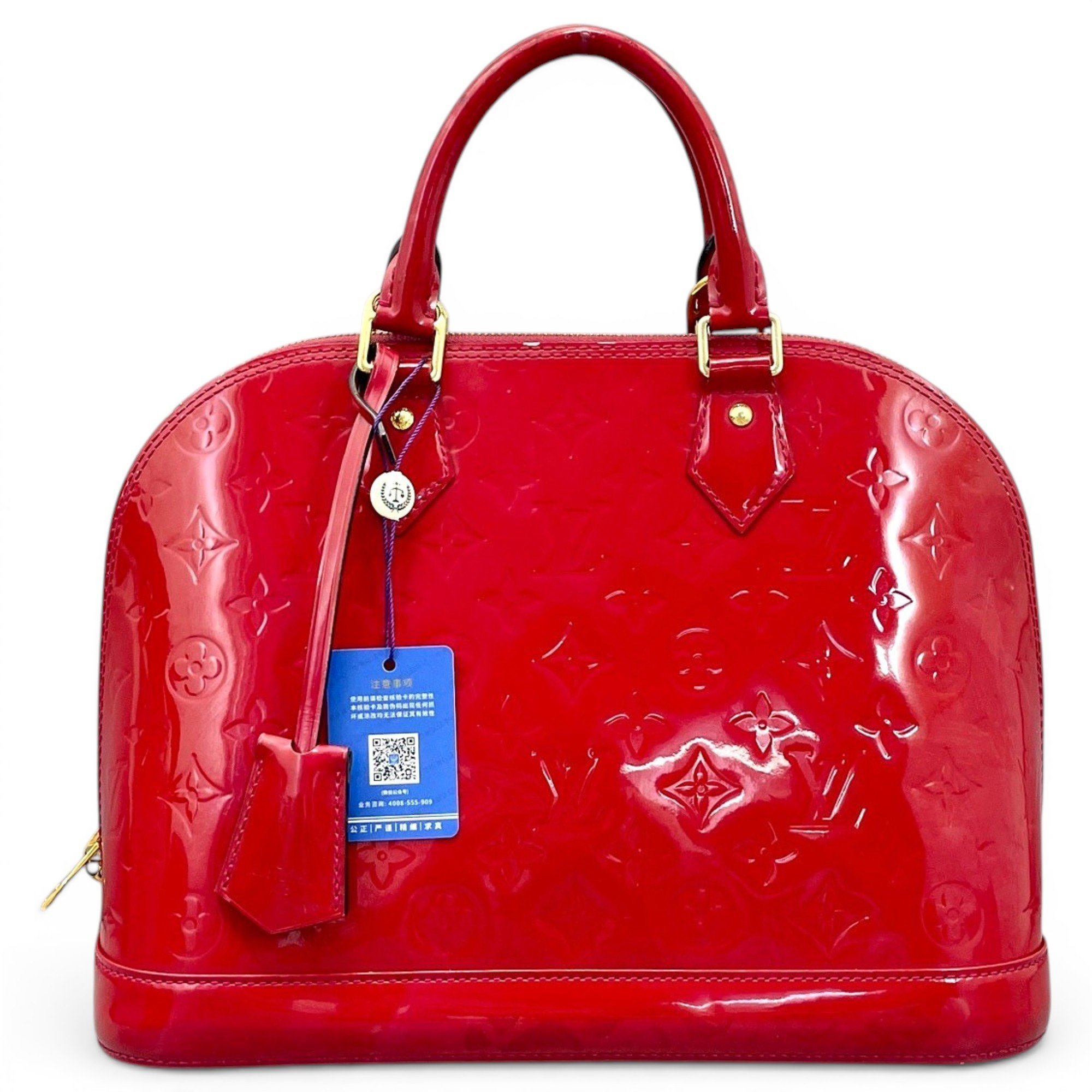Alma patent leather handbag
