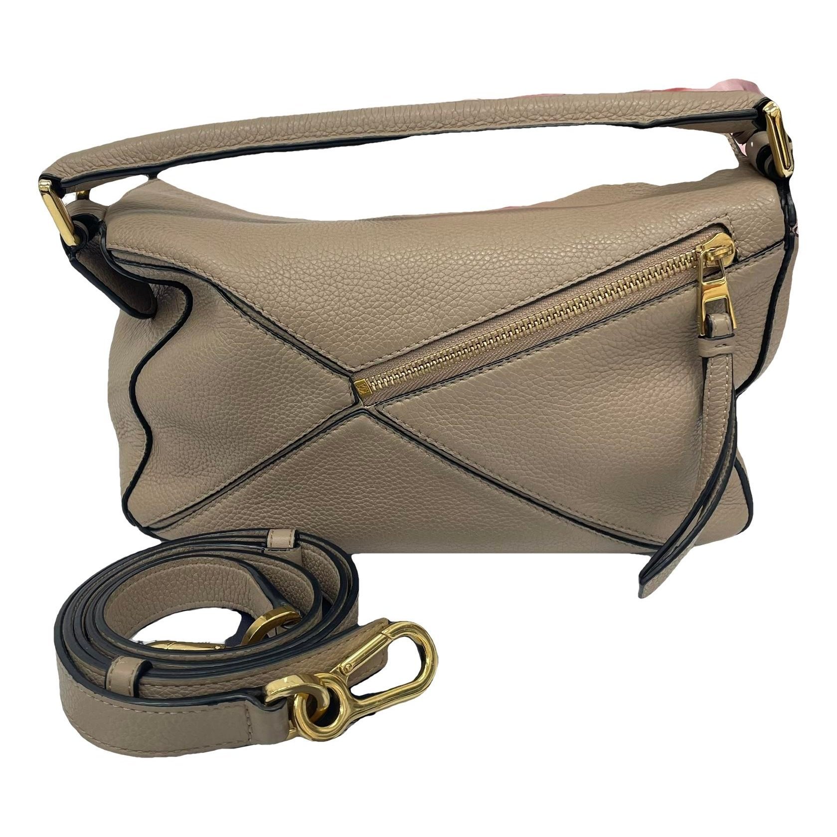Puzzle leather handbag