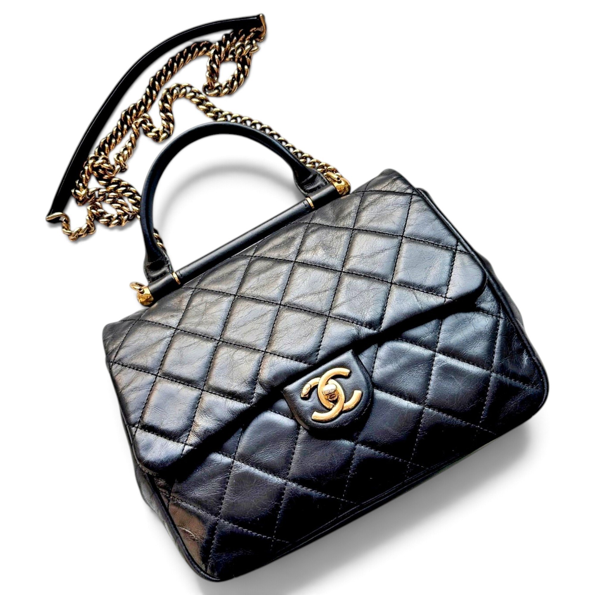 Trendy CC Top Handle leather handbag