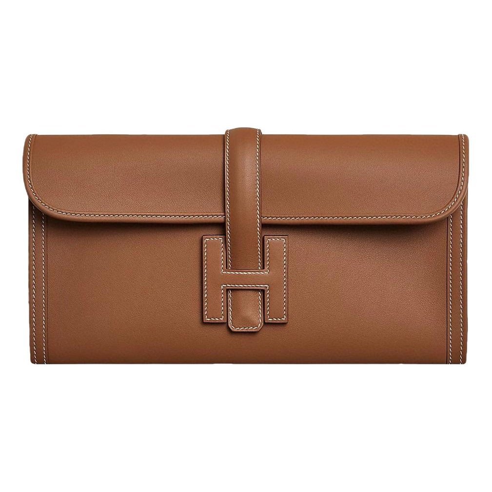 Jige leather clutch bag