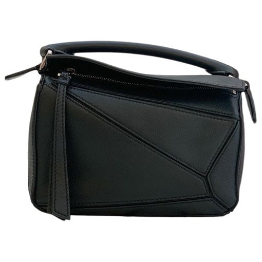Puzzle leather handbag