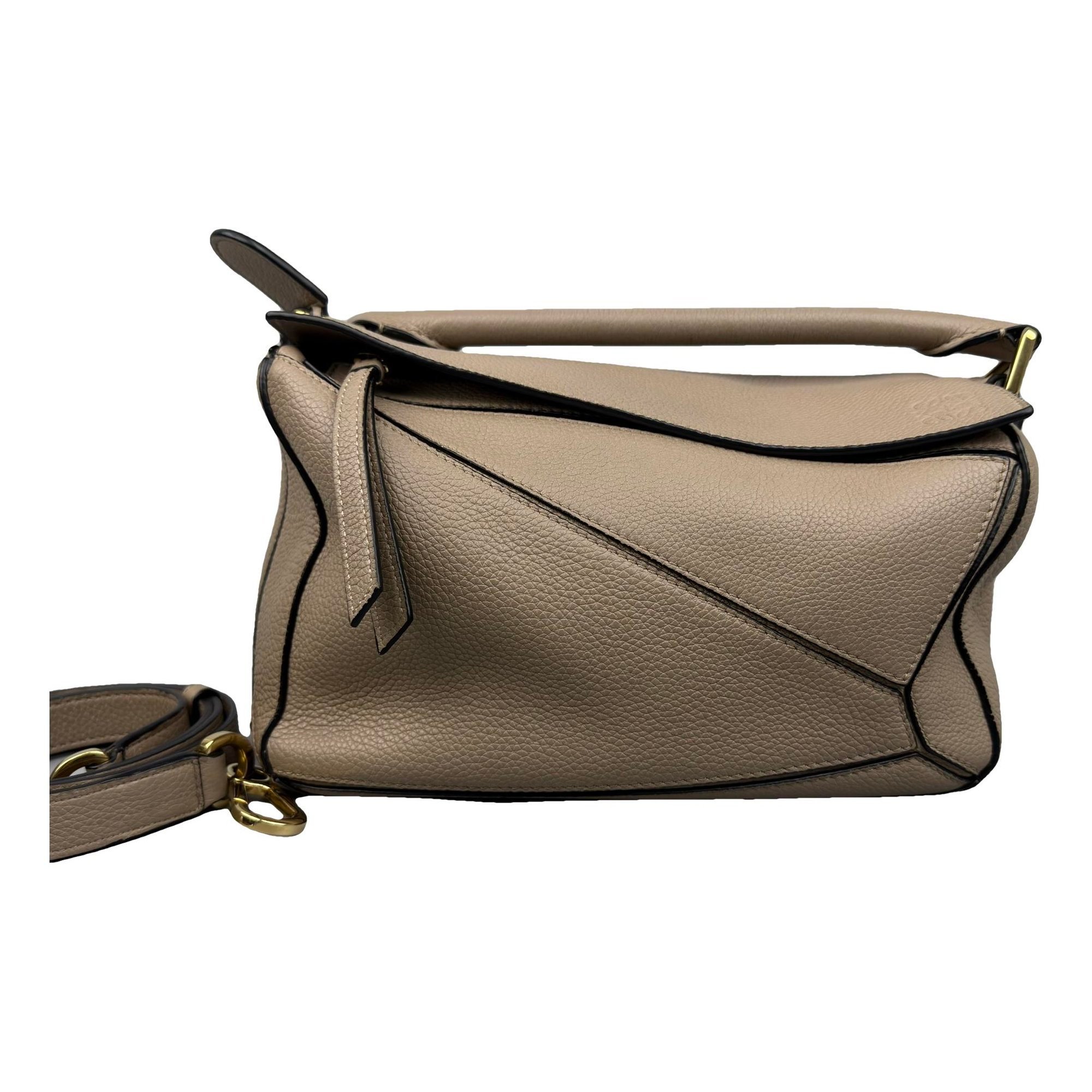 Puzzle leather handbag