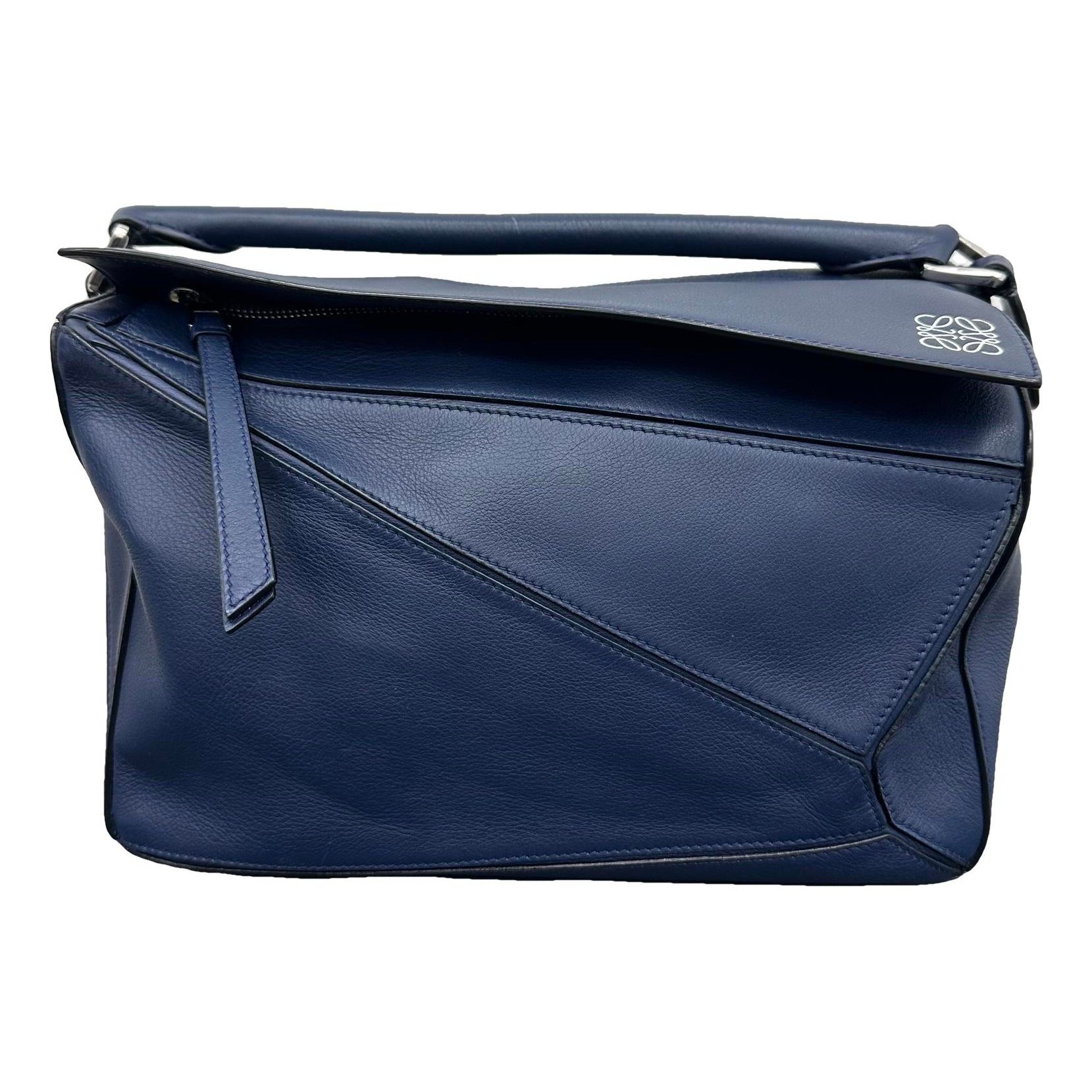 Puzzle leather handbag