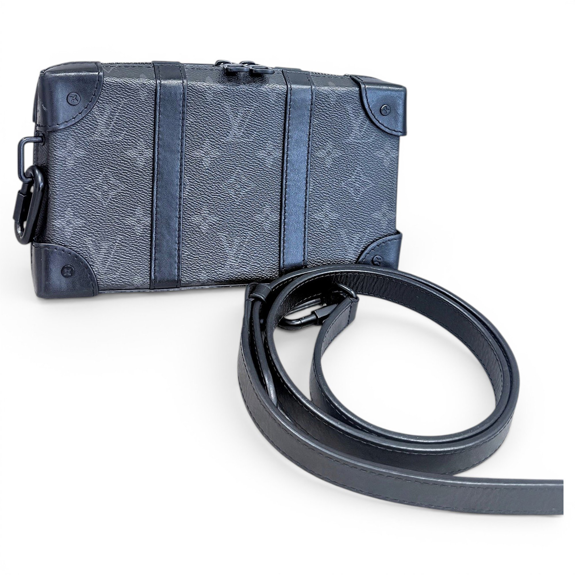 Pochette Trunk leather handbag