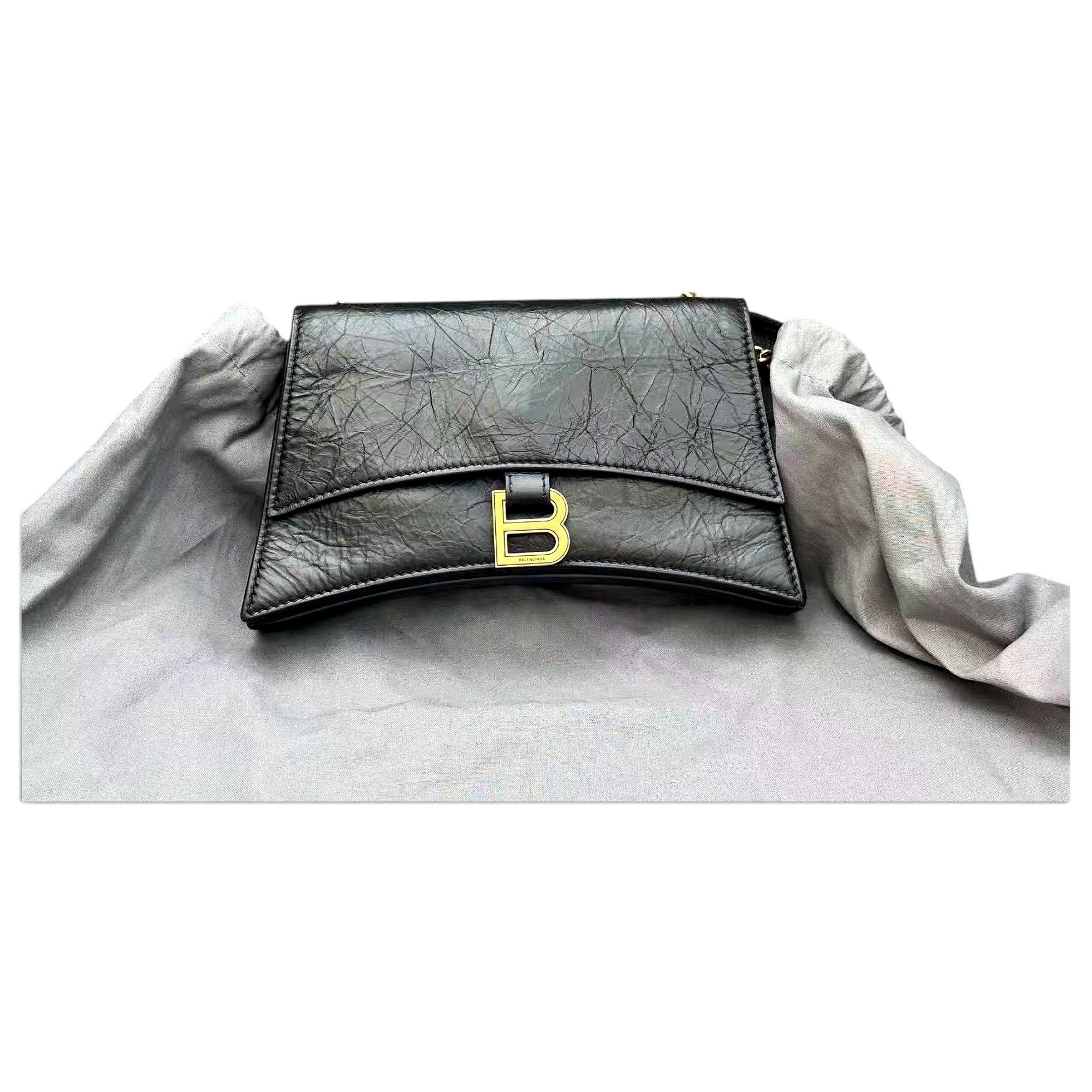 Hourglass leather handbag