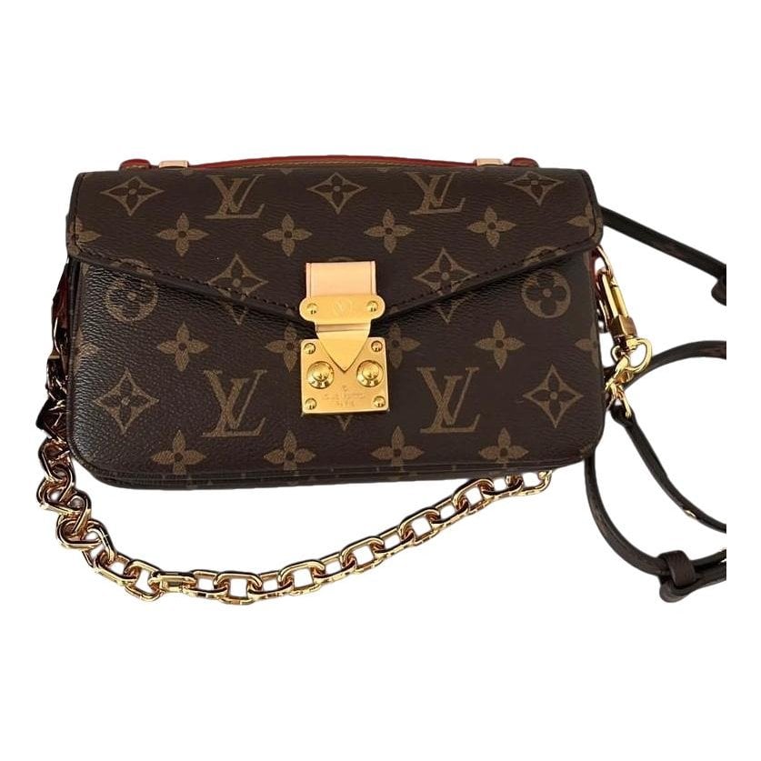 Louis Vuitton Metis East West cloth crossbody bag