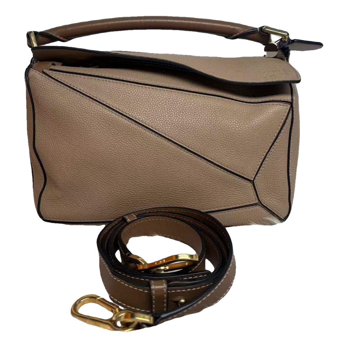 Puzzle leather handbag