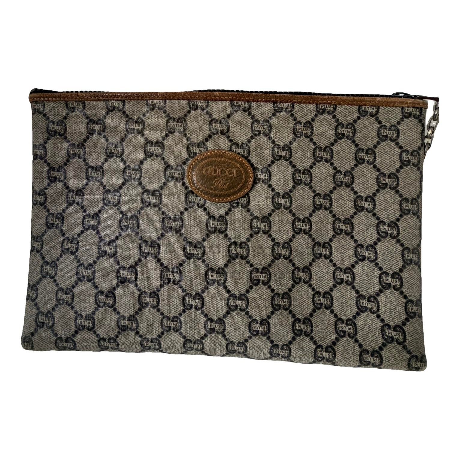 Ophidia cloth clutch bag