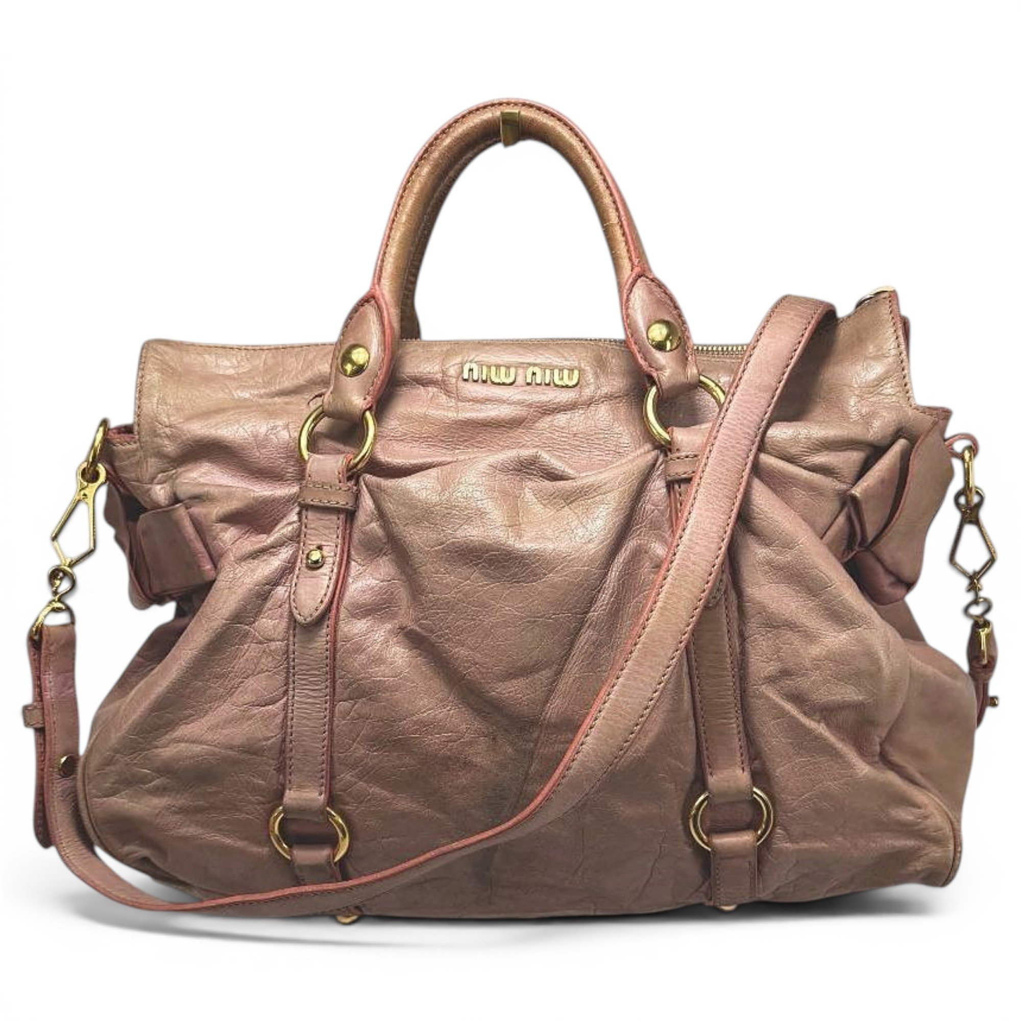 Bow bag leather handbag