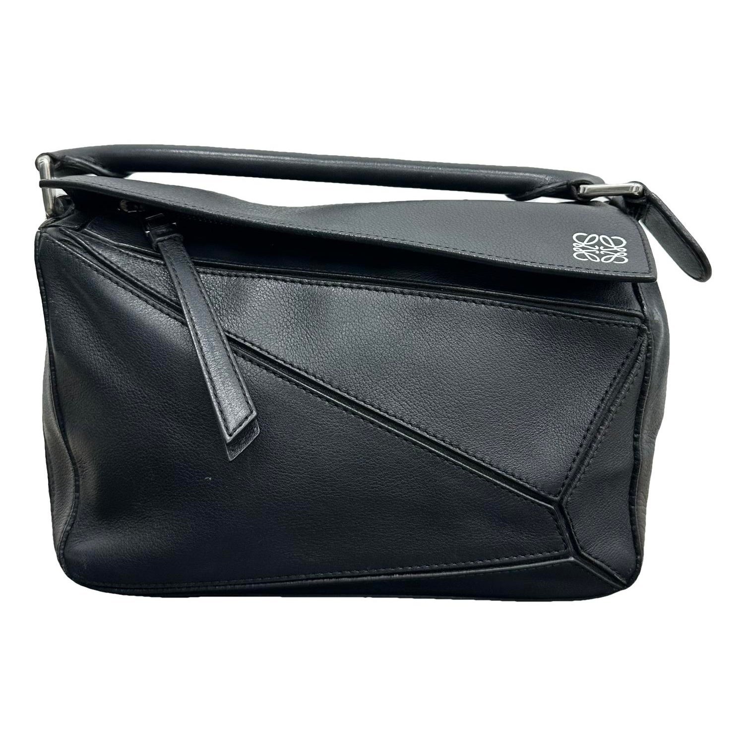 Puzzle leather handbag
