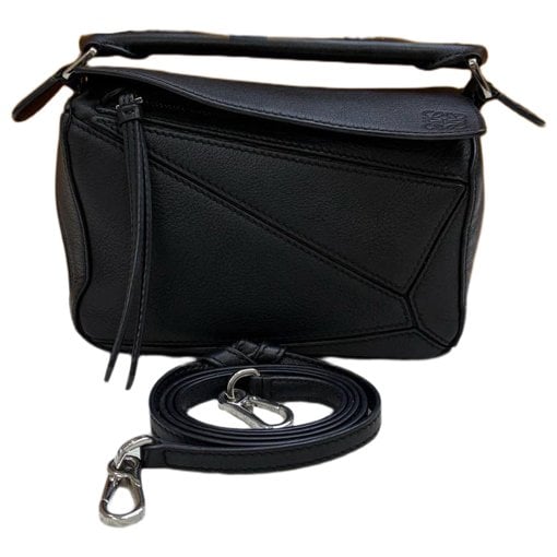 Puzzle leather handbag