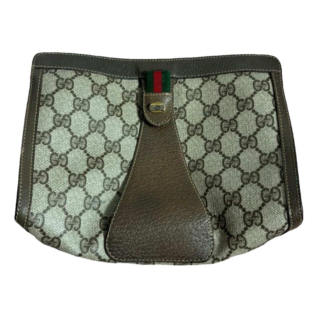 Ophidia leather clutch bag