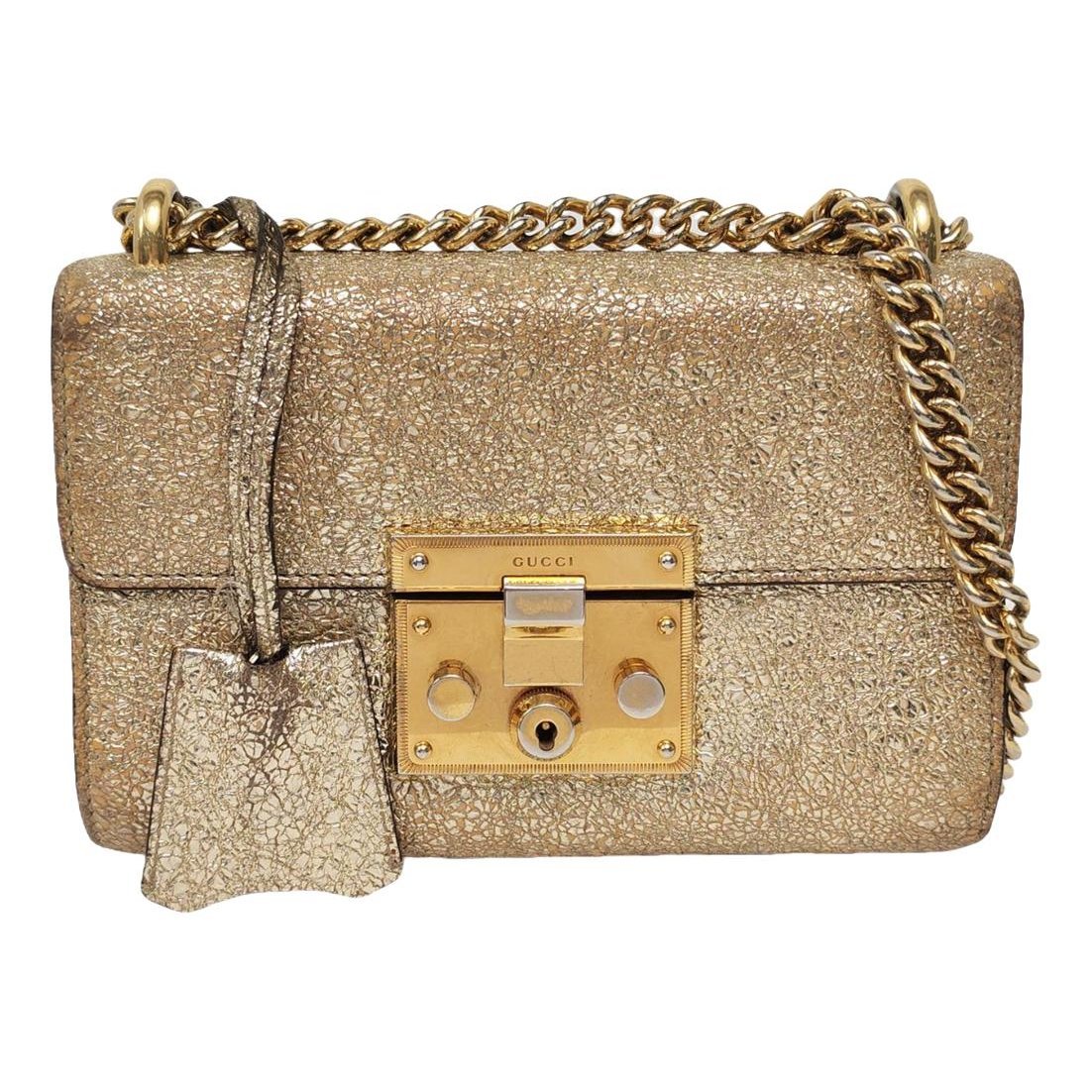Padlock patent leather handbag