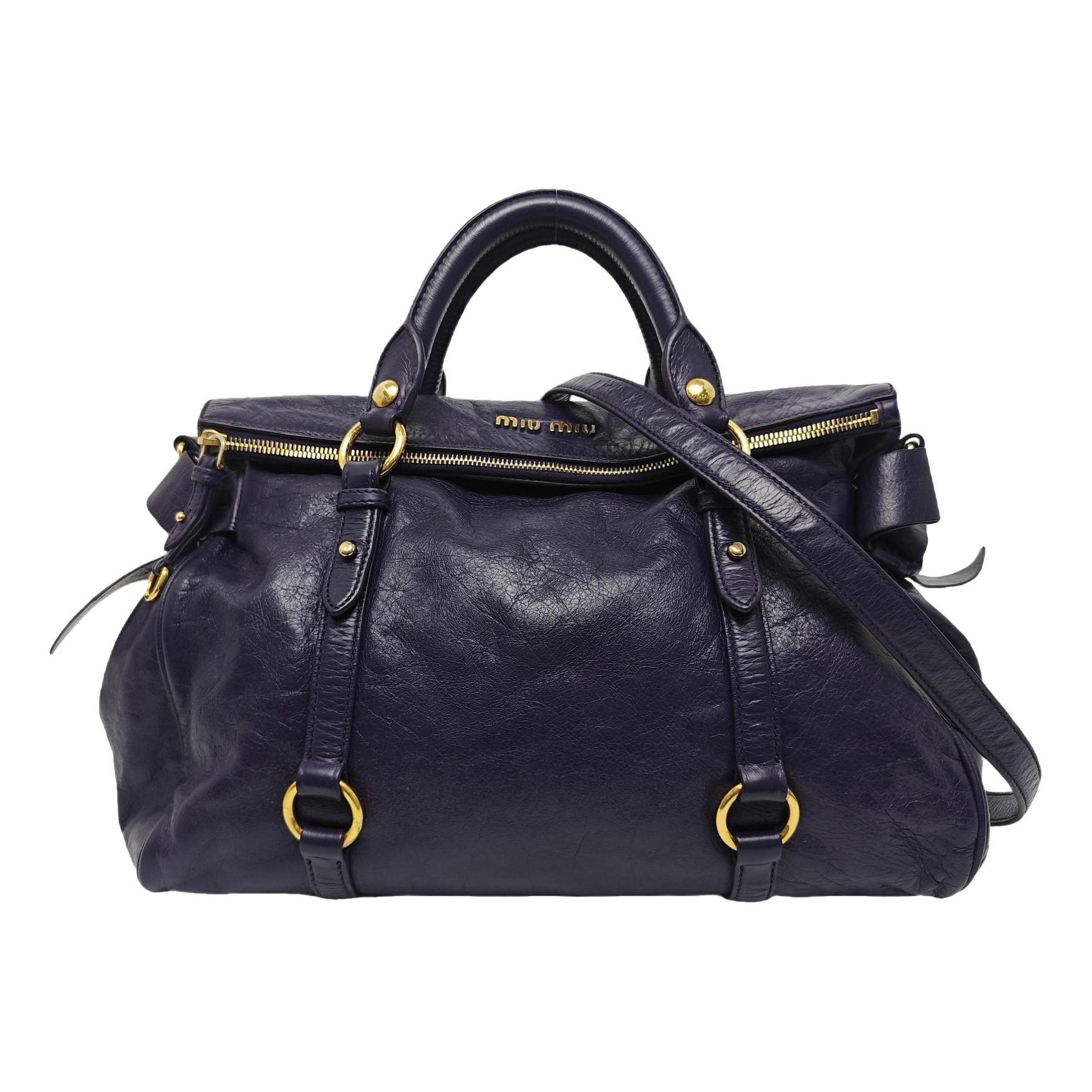 Bow bag leather handbag