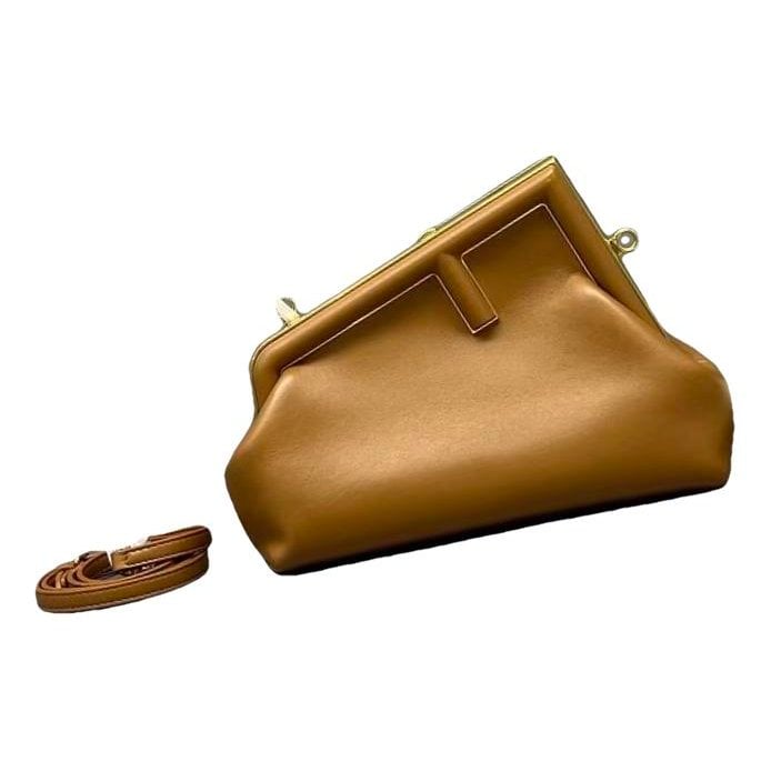 First leather handbag