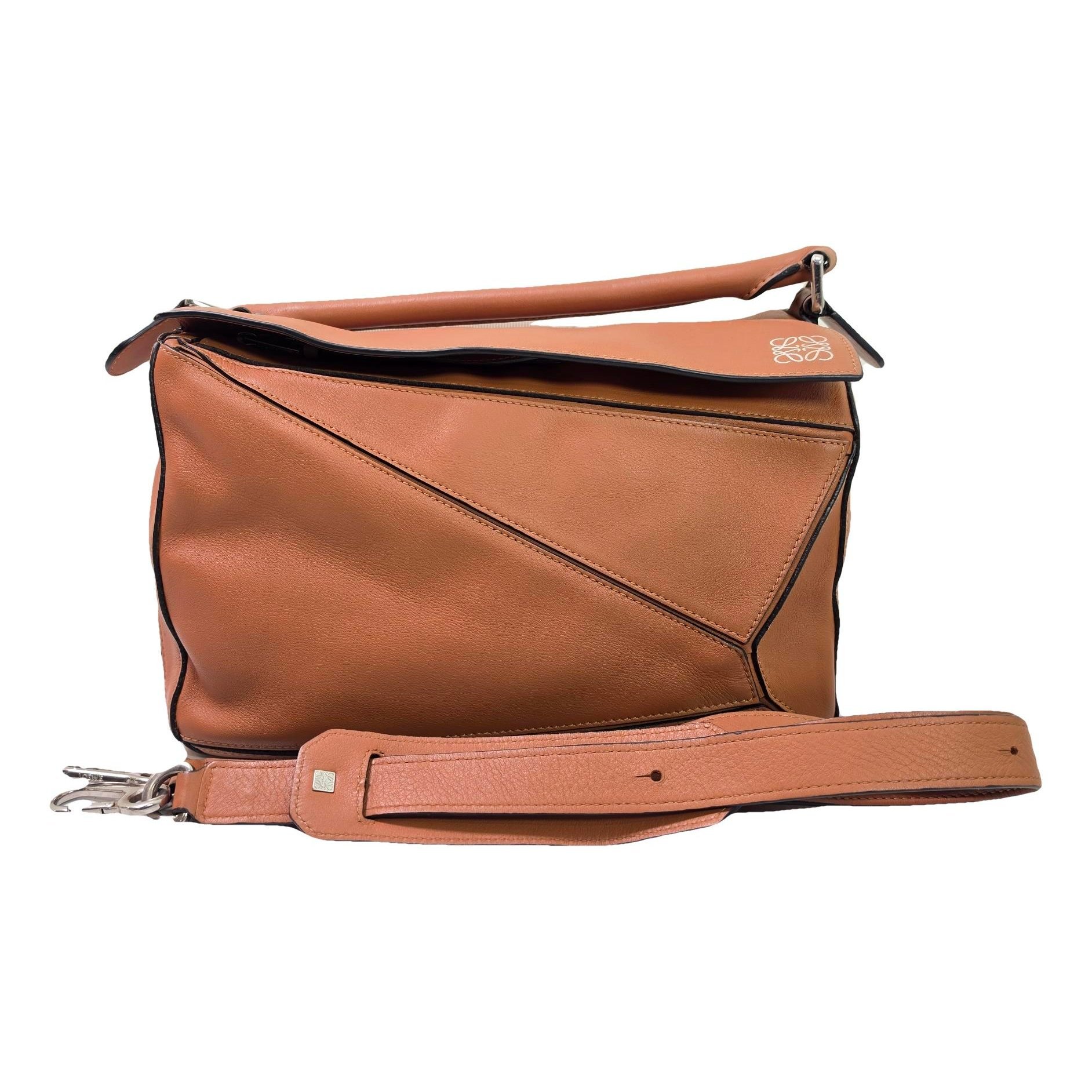 Puzzle leather handbag