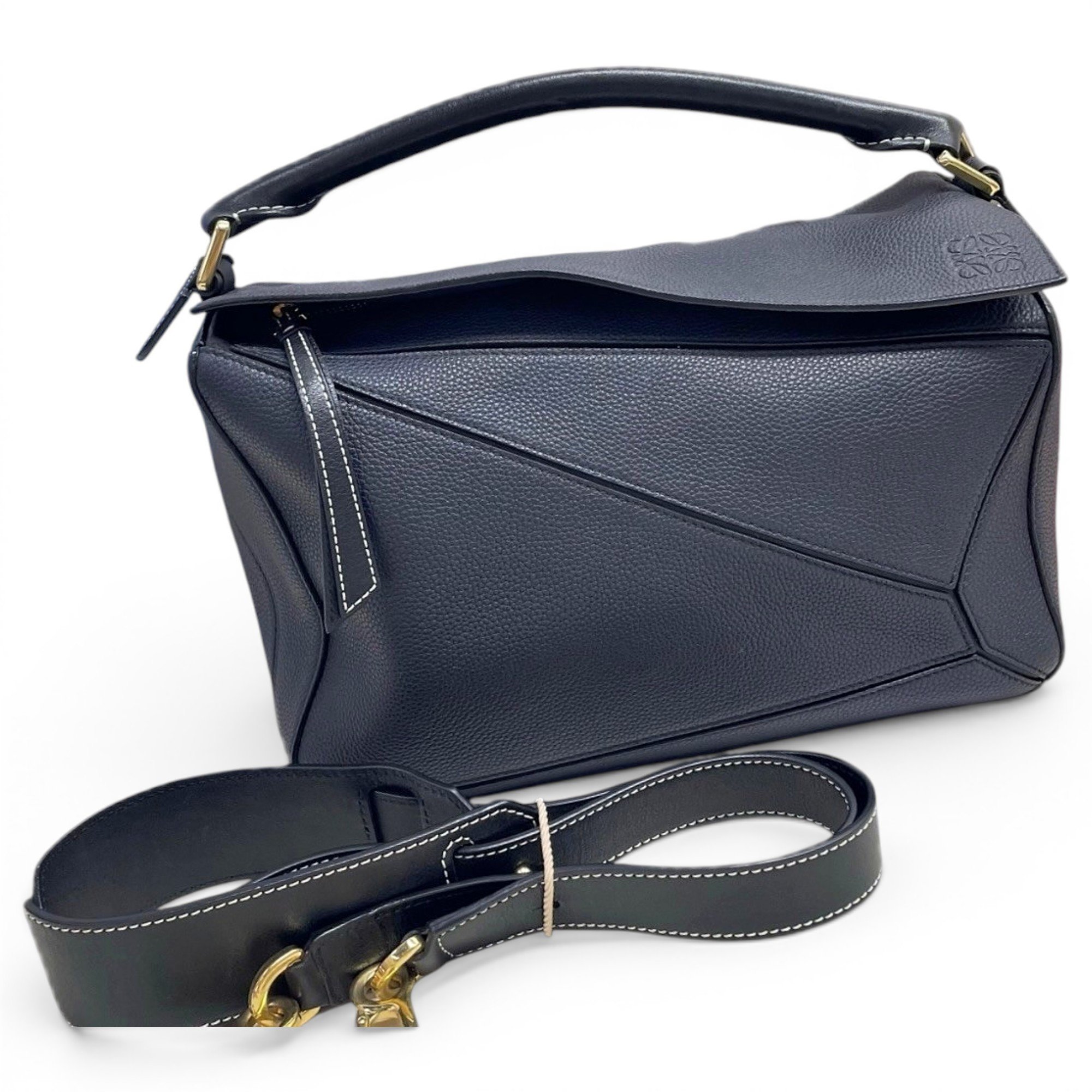Puzzle leather handbag